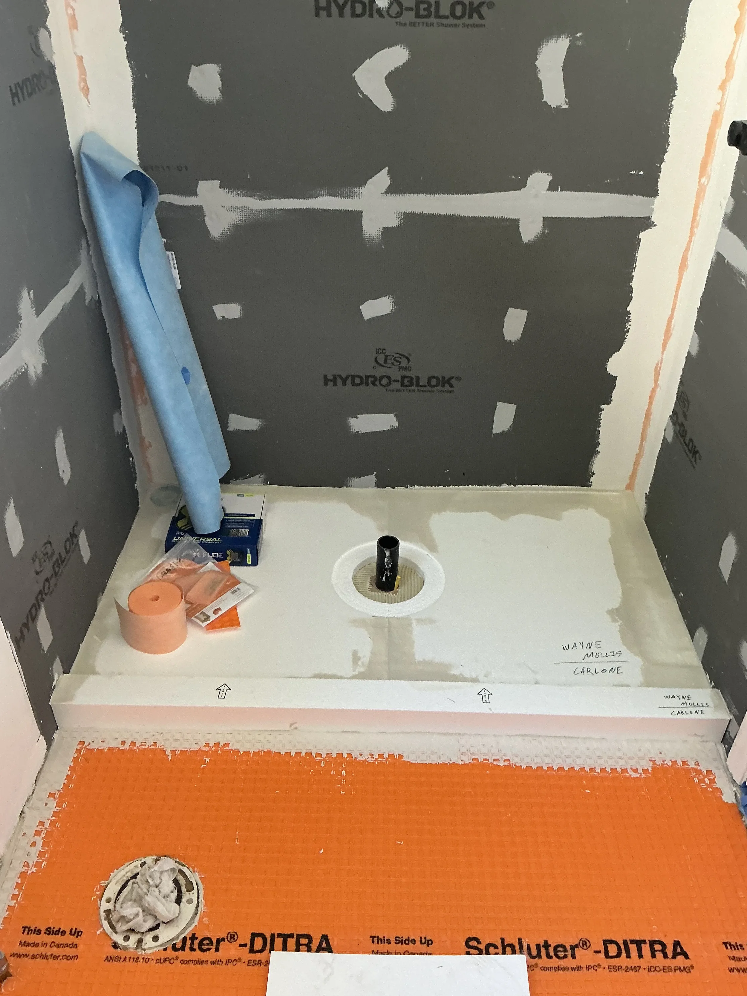 Bathroom remodel in progress in Boulder, CO featuring new shower waterpoofing and shower pan installation