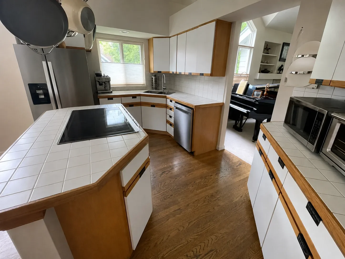 White and wood kitchen in Gunbarrel, CO before start of full home remodel