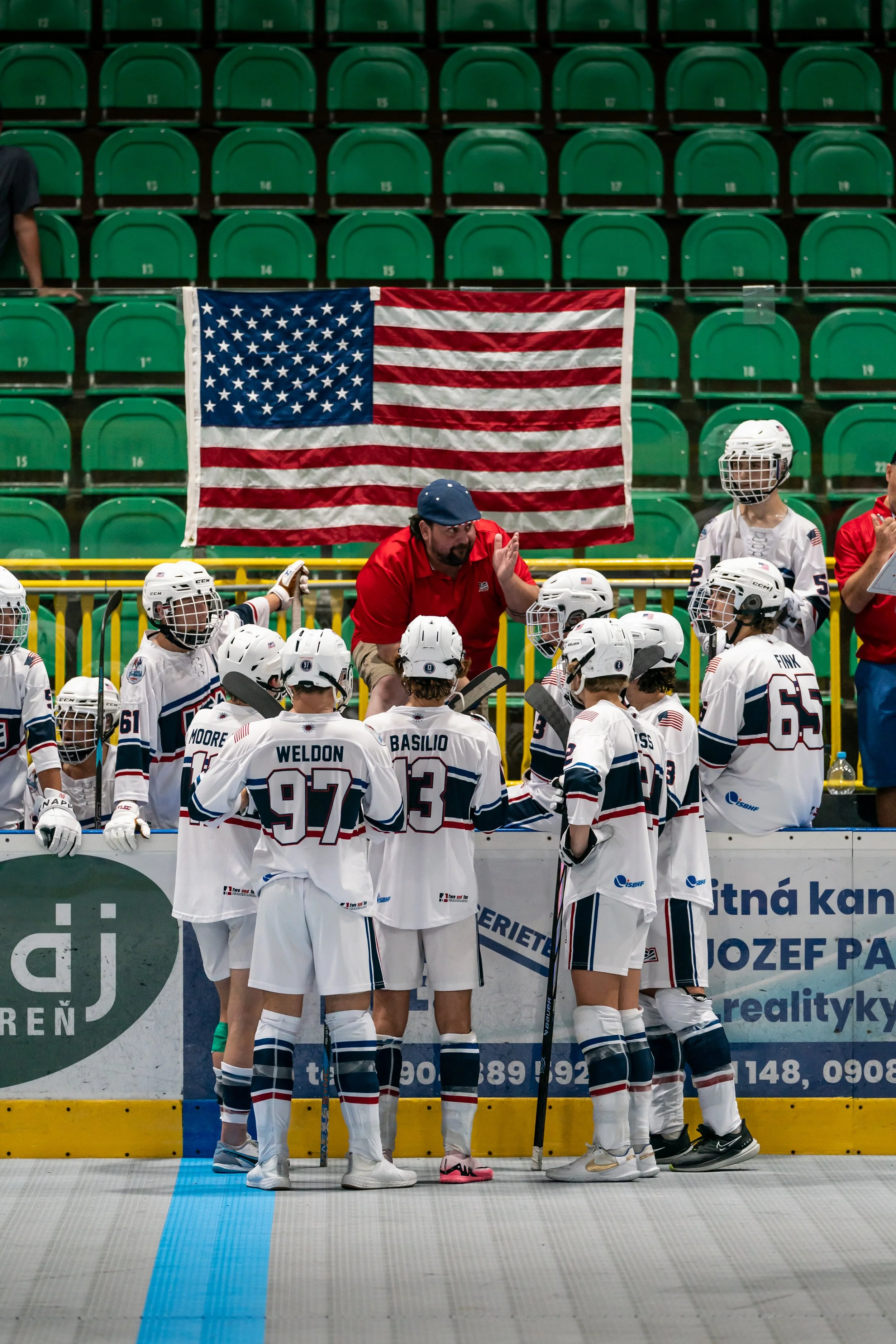 Coach Rennebeck rallies his team during a timeout in the final minutes against Canada
