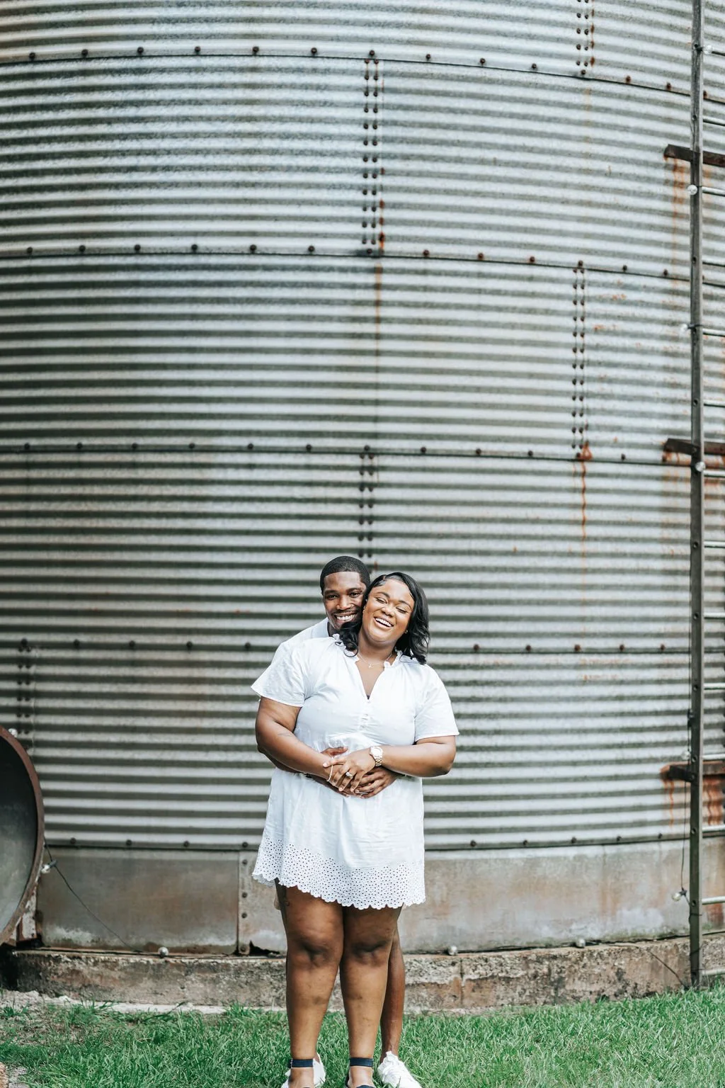 Couple engagement portraits in pine forest at Chande Pines Pembroke Georgia cinematic photography