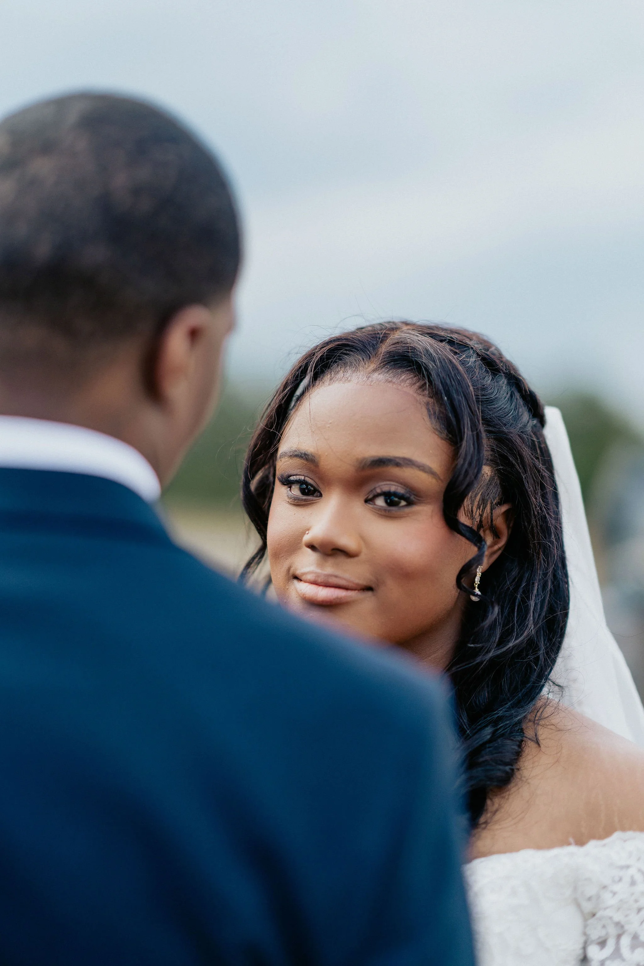 Richmond Hill GA bride and groom close-up portrait bride looking directly at camera cinematic wedding photography by ARG Foto