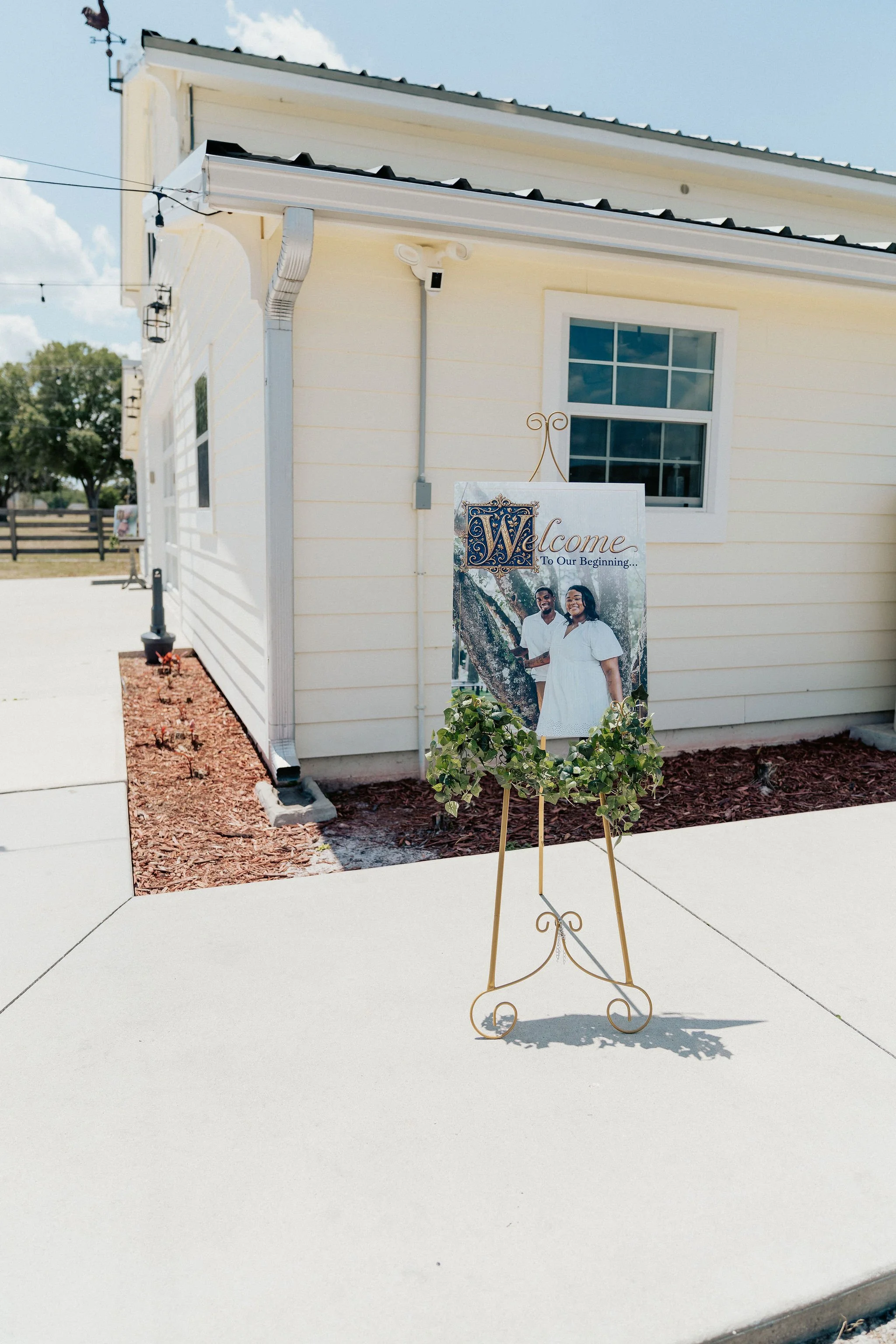 Bride and groom portrait at Brannan’s Barn wedding venue in Jacksonville Florida captured during a 2026 wedding with rustic barn and golden hour light by ARG Foto