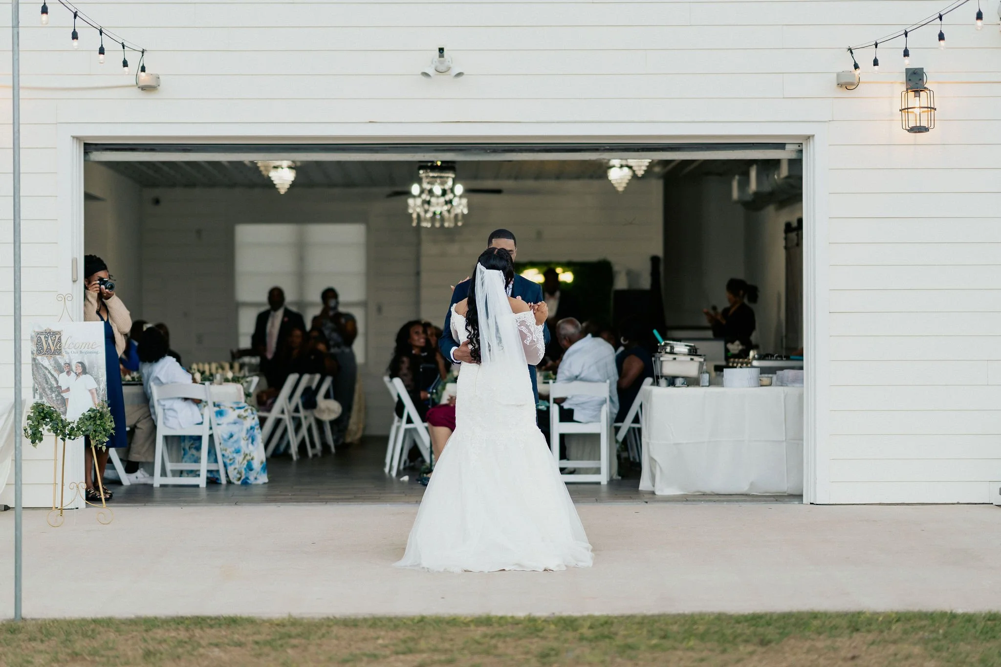 Bride and groom portrait at Brannan’s Barn wedding venue in Jacksonville Florida captured during a 2026 wedding with rustic barn and golden hour light by ARG Foto