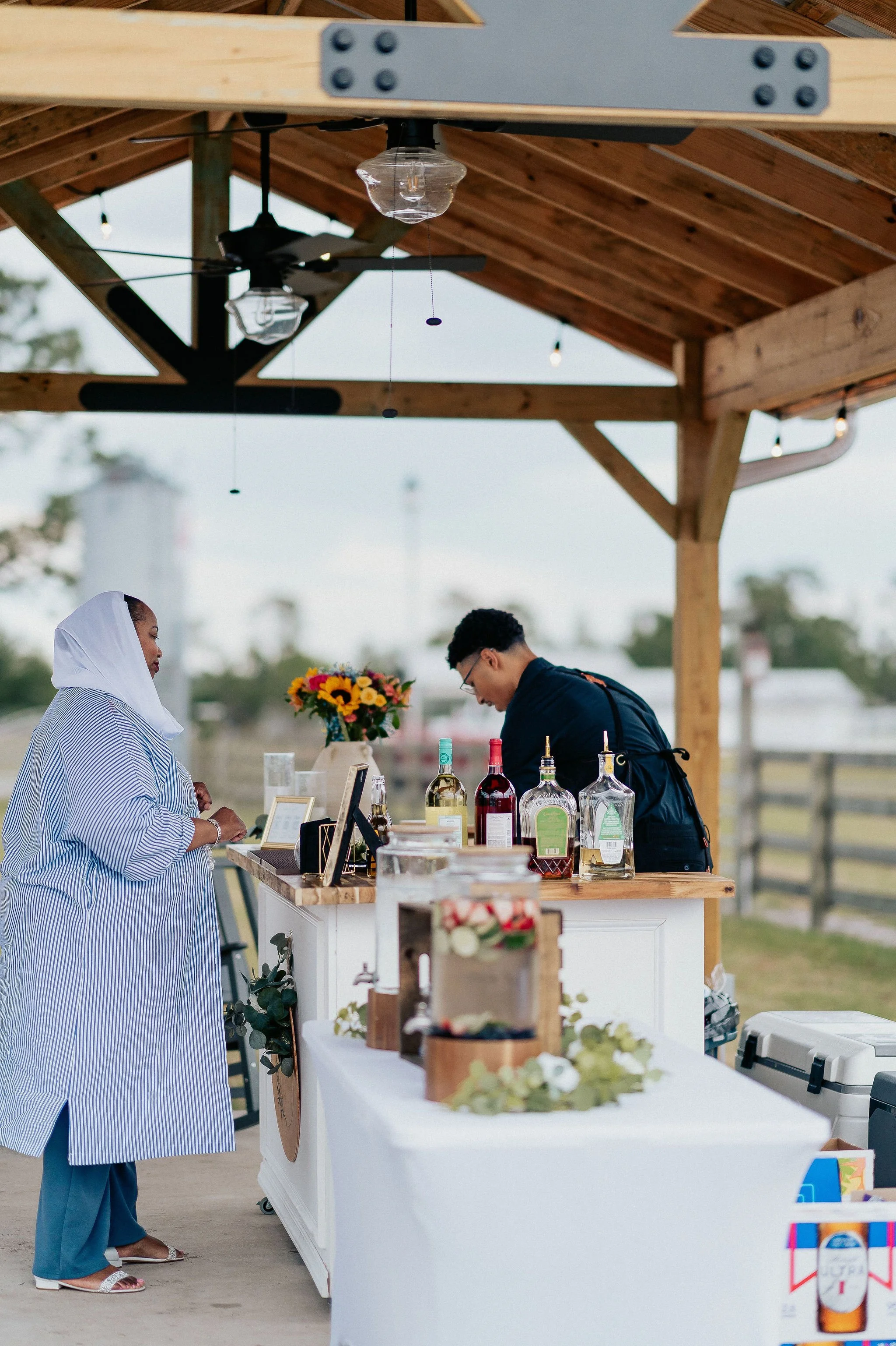 Bride and groom portrait at Brannan’s Barn wedding venue in Jacksonville Florida captured during a 2026 wedding with rustic barn and golden hour light by ARG Foto