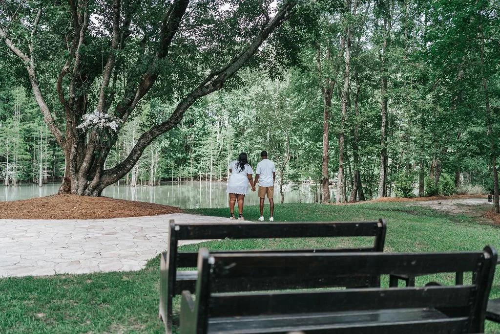 Couple engagement portraits in pine forest at Chande Pines Pembroke Georgia cinematic photography