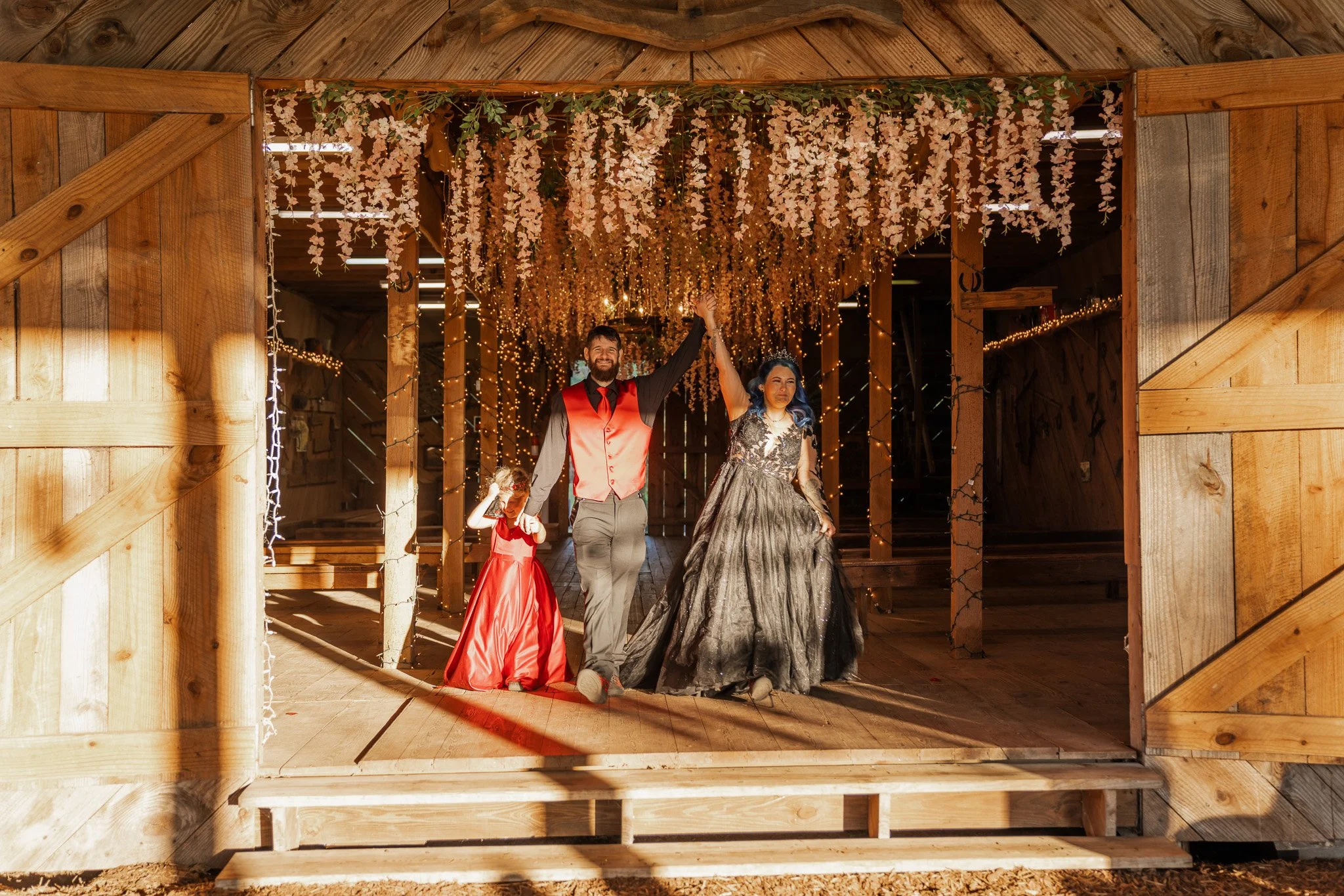 Bride and Groom grand entrance at Meldrim Woods Plantation wedding venue in Brooklet GA during a romantic barn wedding captured by ARG Foto