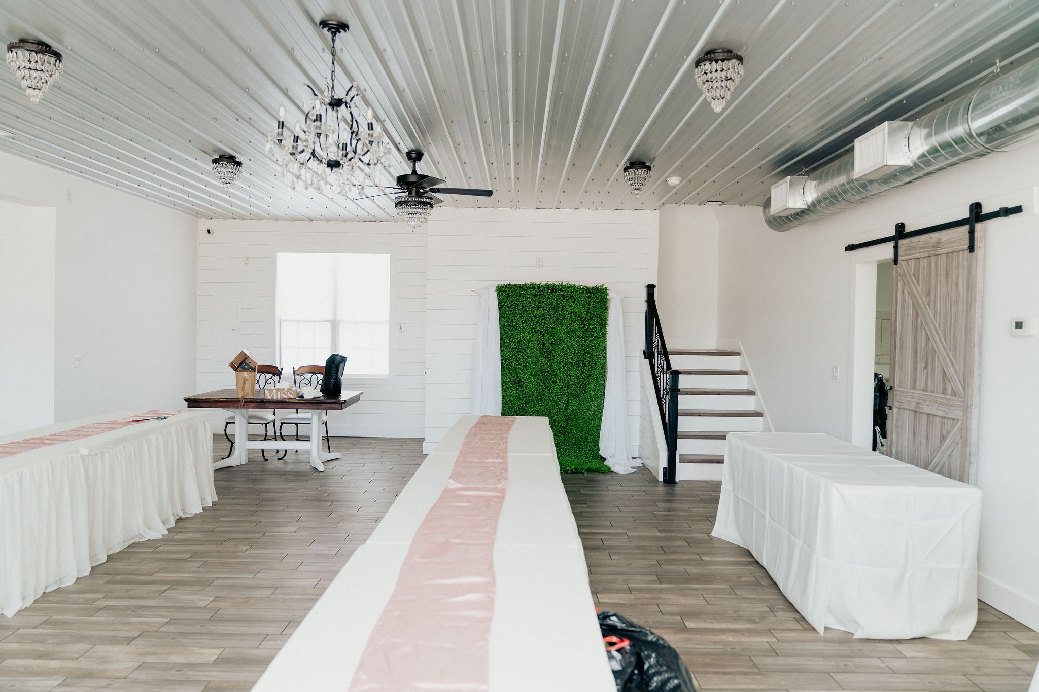 Bride and groom portrait at Brannan’s Barn wedding venue in Jacksonville Florida captured during a 2026 wedding with rustic barn and golden hour light by ARG Foto