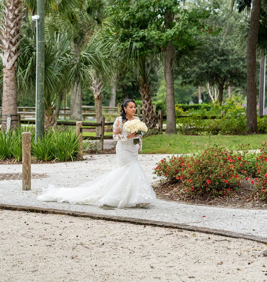 Couple portrait at Oyster Factory Park in Bluffton, South Carolina, during a 2025 wedding—capturing the waterfront beauty of the May River and the timeless Lowcountry atmosphere in an editorial, cinematic style by ARG Foto.