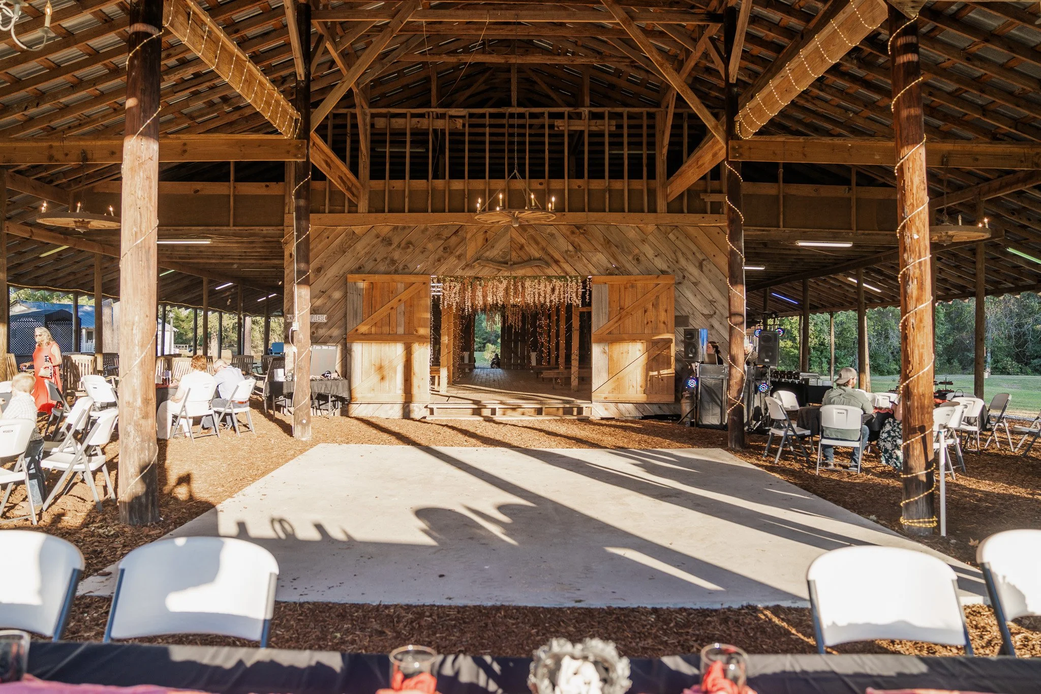 wedding reception at Meldrim Woods Plantation wedding venue in Brooklet GA during a romantic barn wedding captured by ARG Foto