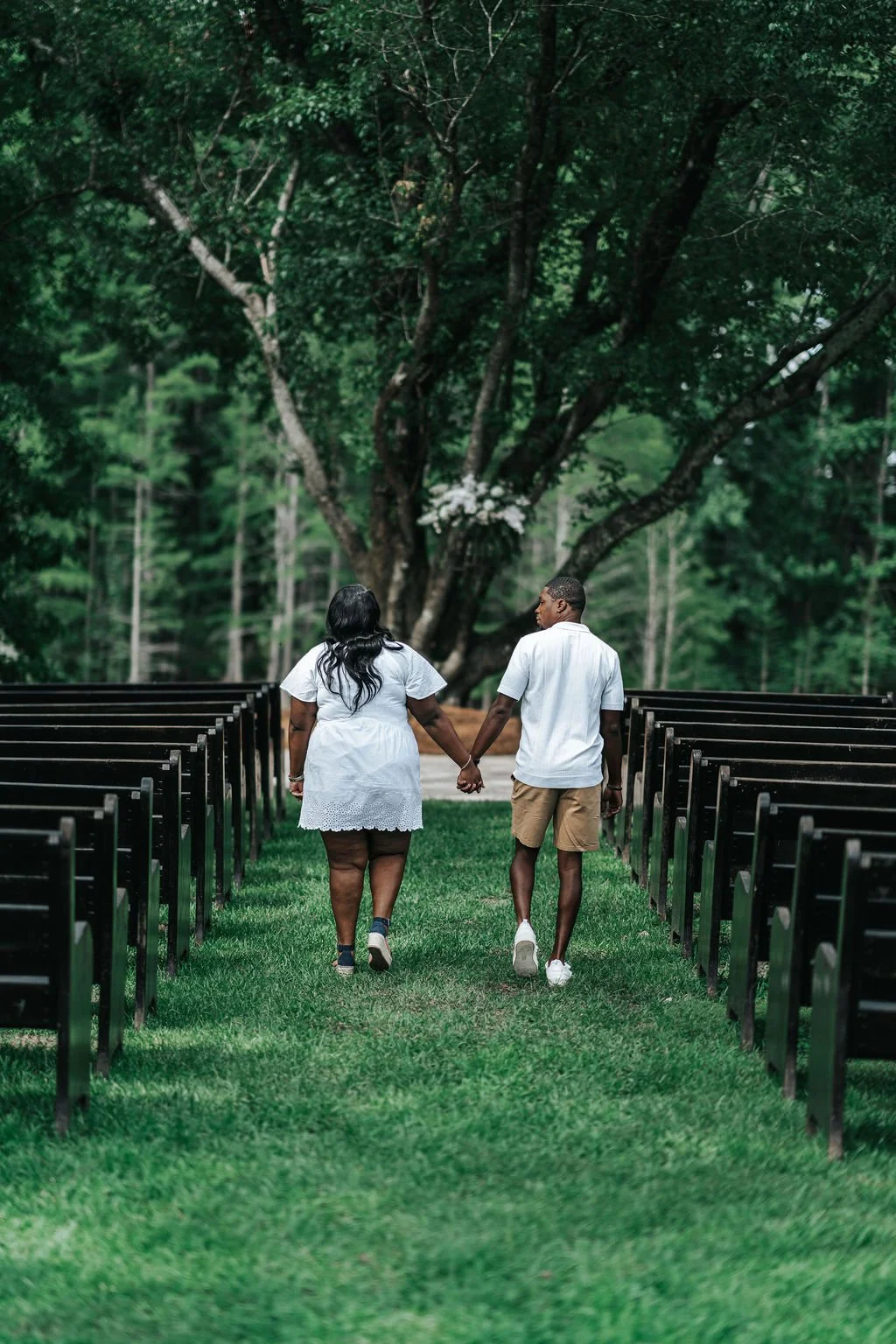 Couple engagement portraits in pine forest at Chande Pines Pembroke Georgia cinematic photography