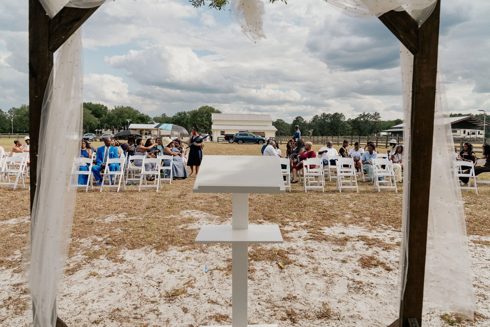 Bride and groom portrait at Brannan’s Barn wedding venue in Jacksonville Florida captured during a 2026 wedding with rustic barn and golden hour light by ARG Foto