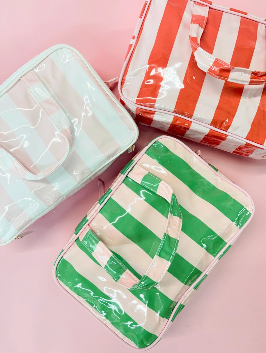 Pretty meets practical. Our candy-colored striped cosmetic bags are your new go-to for beauty, travel, and everything in between. With bold colors, wipeable finishes, and smart compartments, they&rsquo;re as fun as they are functional.

- Glossy, wat