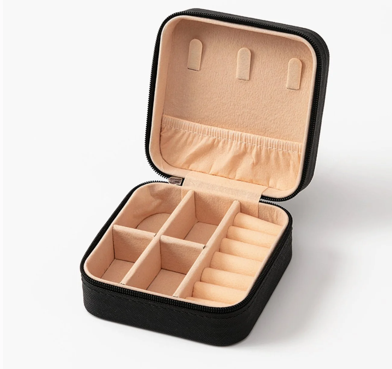 Small, organized, and ready to go. This mini square jewelry organizer is your new travel essential, perfect for keeping your favorite pieces tangle-free and easy to find wherever you are. Designed with a compact shape that fits effortlessly into your