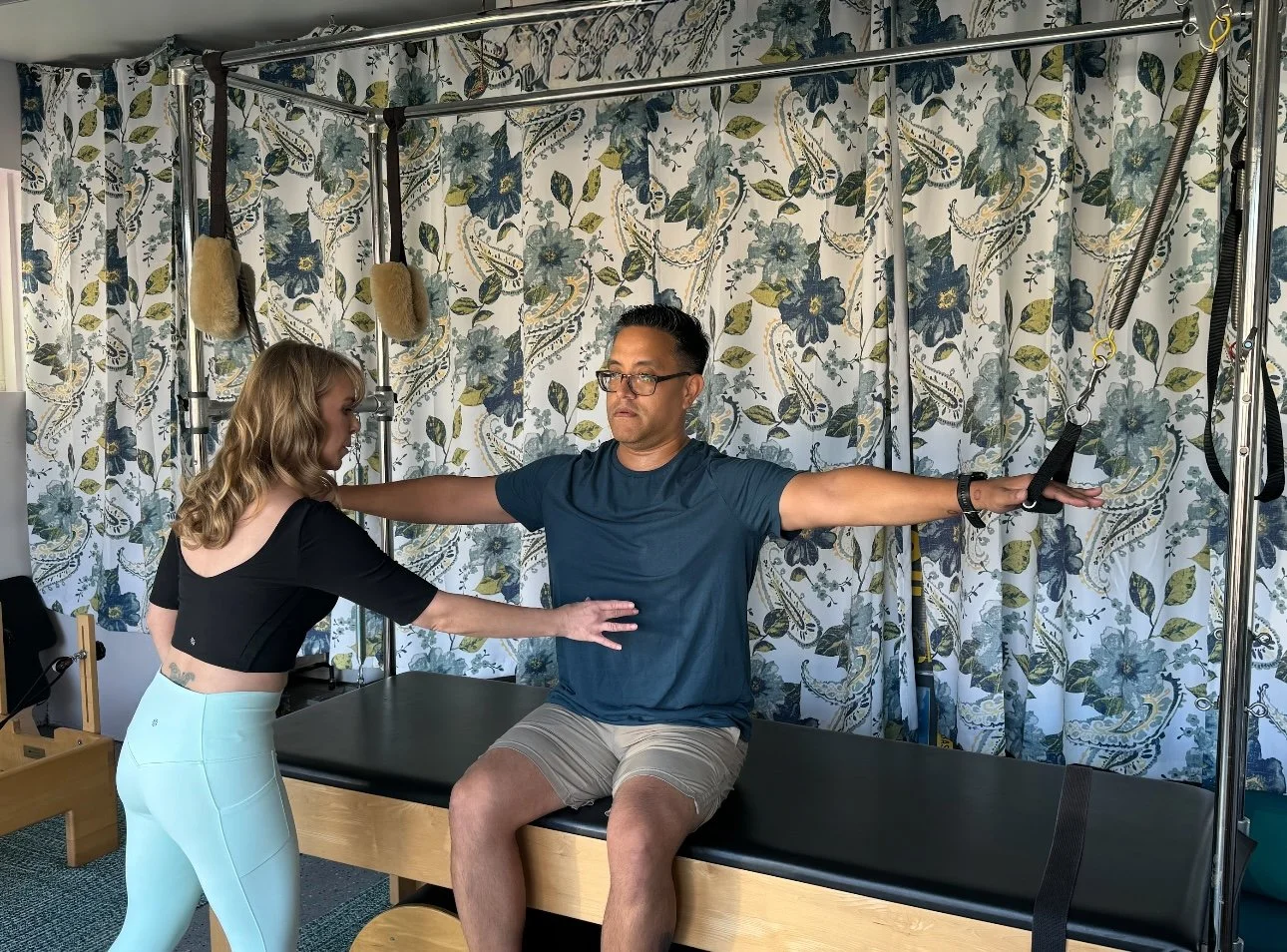 Pilates instructor Sarah Meinert demonstrating functional movement training