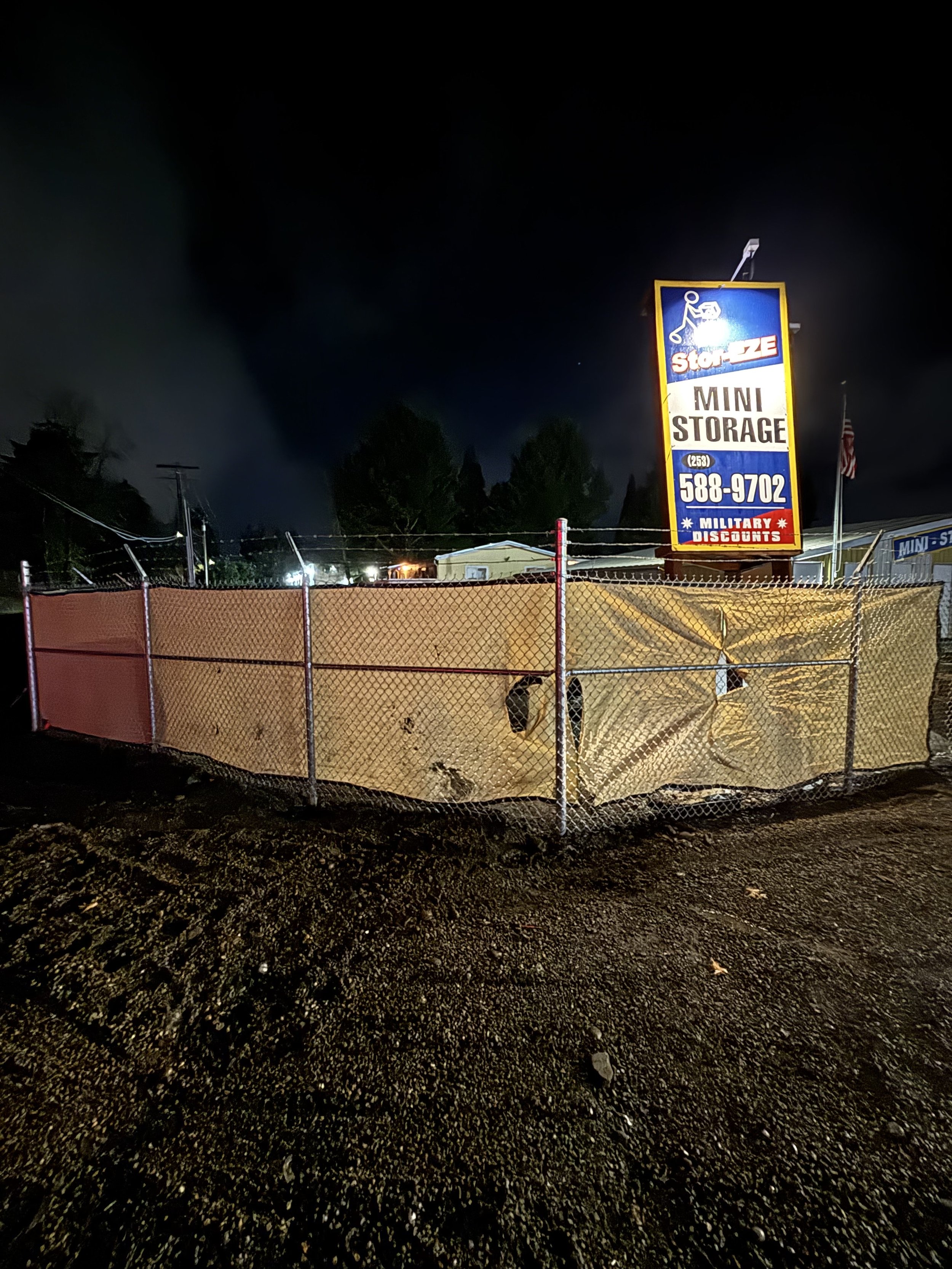 repaired fence at a storage facility