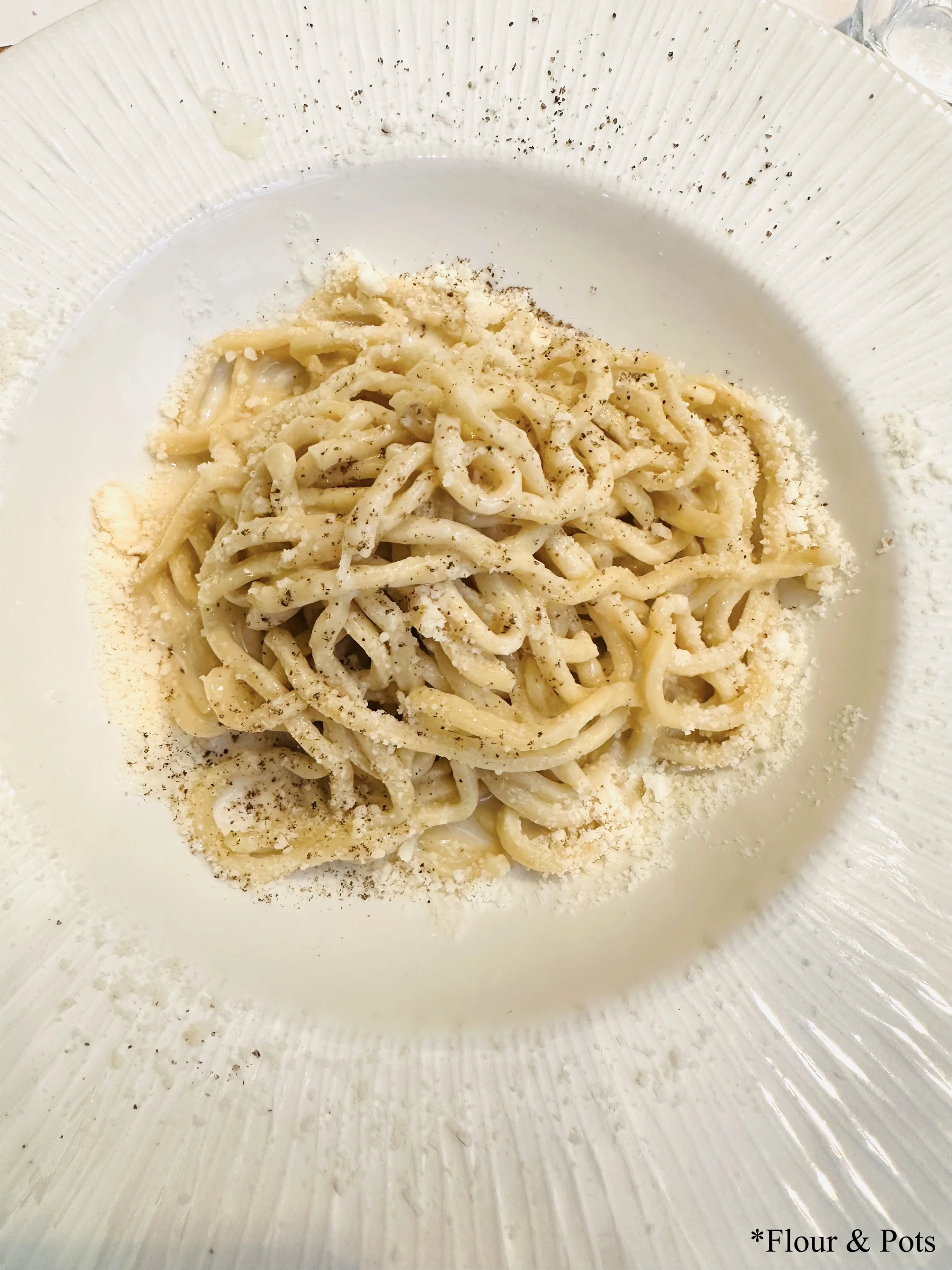 Cacio e Pepe from Emma in Rome, Italy — made with Pecorino Romano, Pecorino di Fossa, and freshly roasted black pepper for a rich, creamy, and peppery flavor.