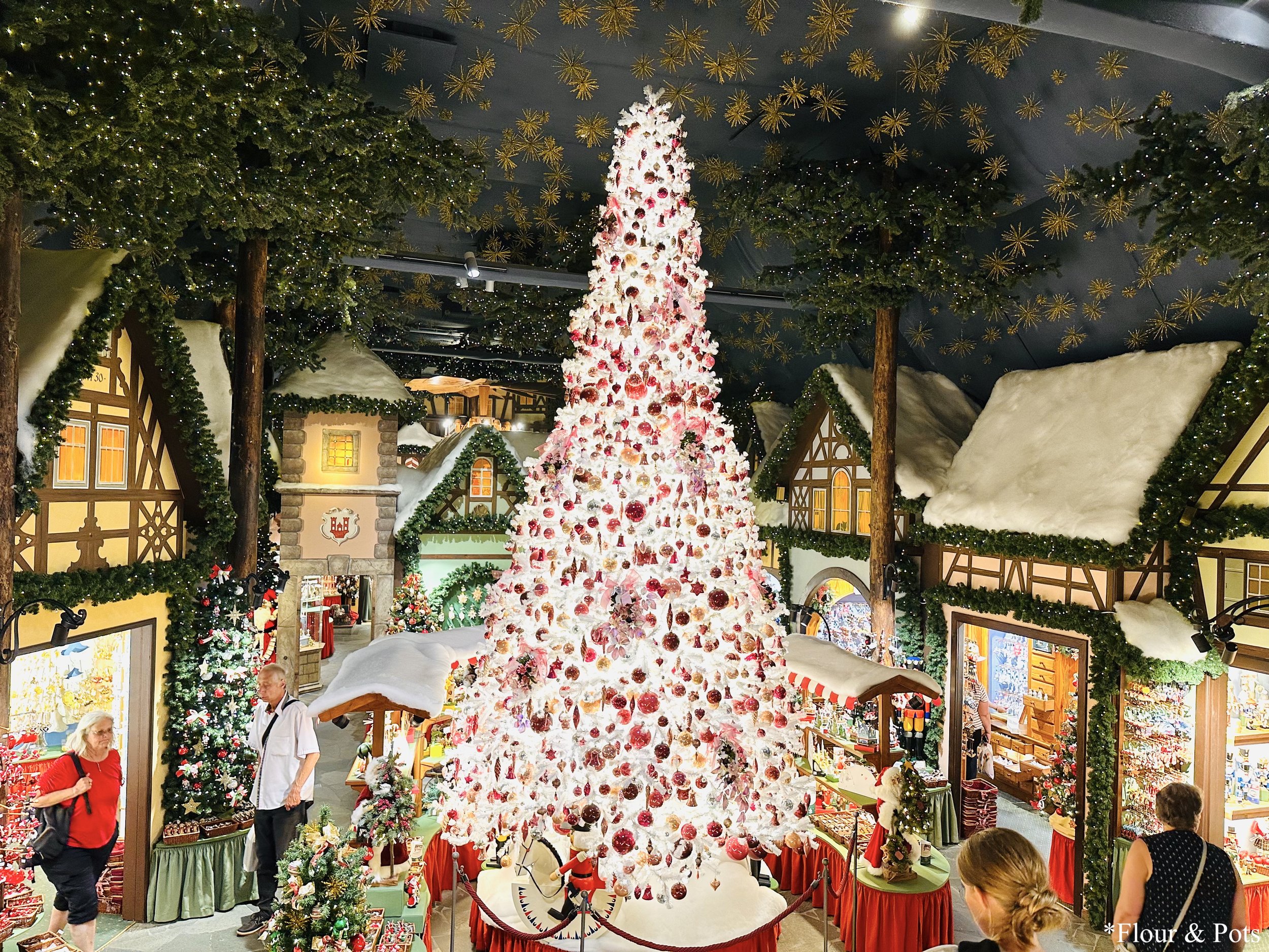Festively decorated Christmas store in Rothenburg, Germany, filled with traditional ornaments, nutcrackers, and holiday decorations.