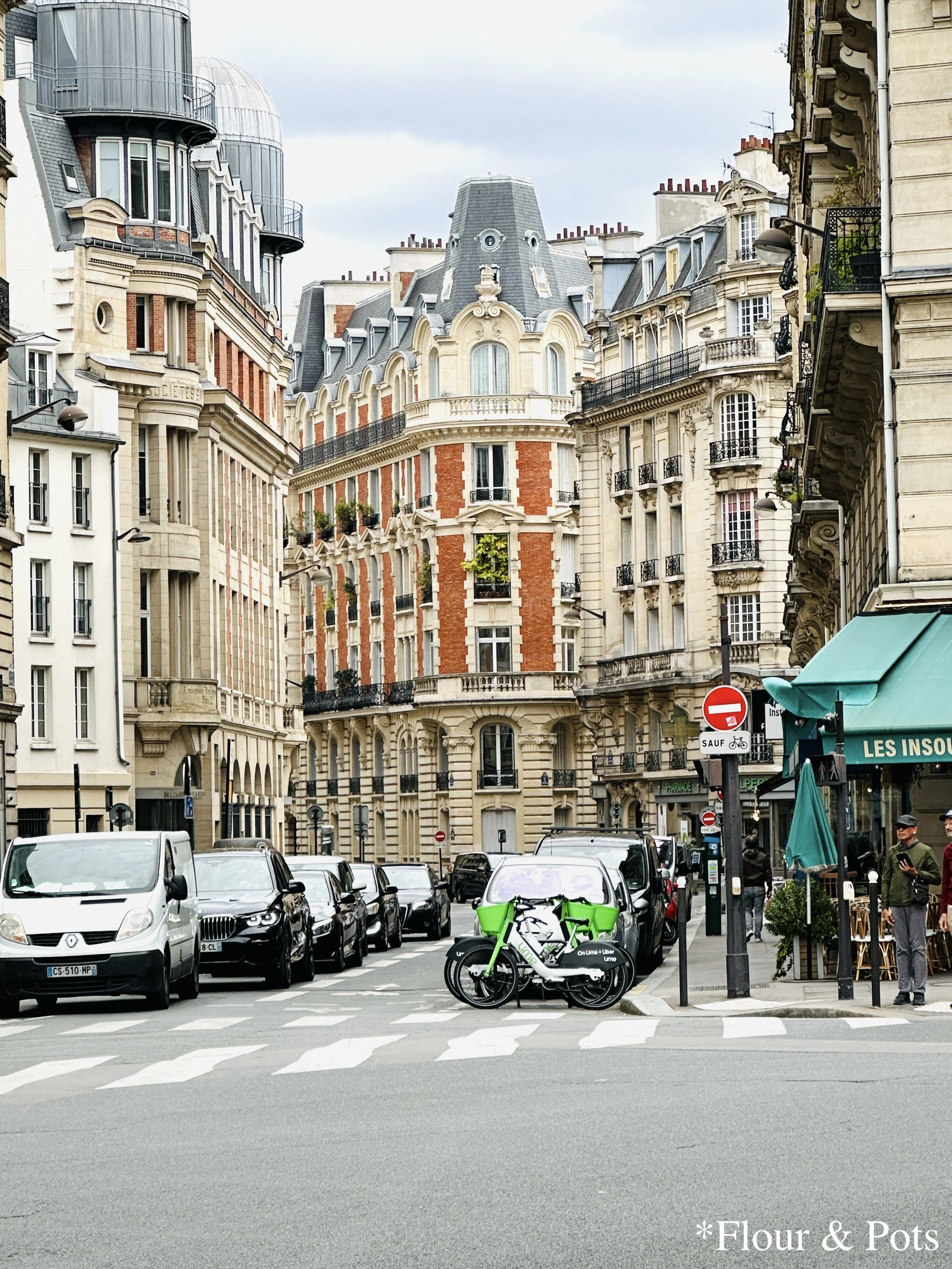 A cute Parisian street lined with charming old buildings in Paris, France.