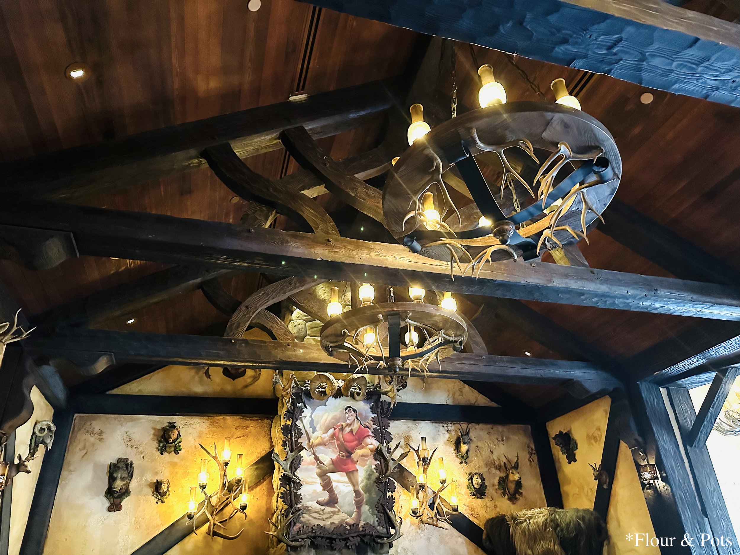 Large portrait of Gaston inside Gaston’s Tavern at Walt Disney World’s Magic Kingdom, Orlando, Florida.