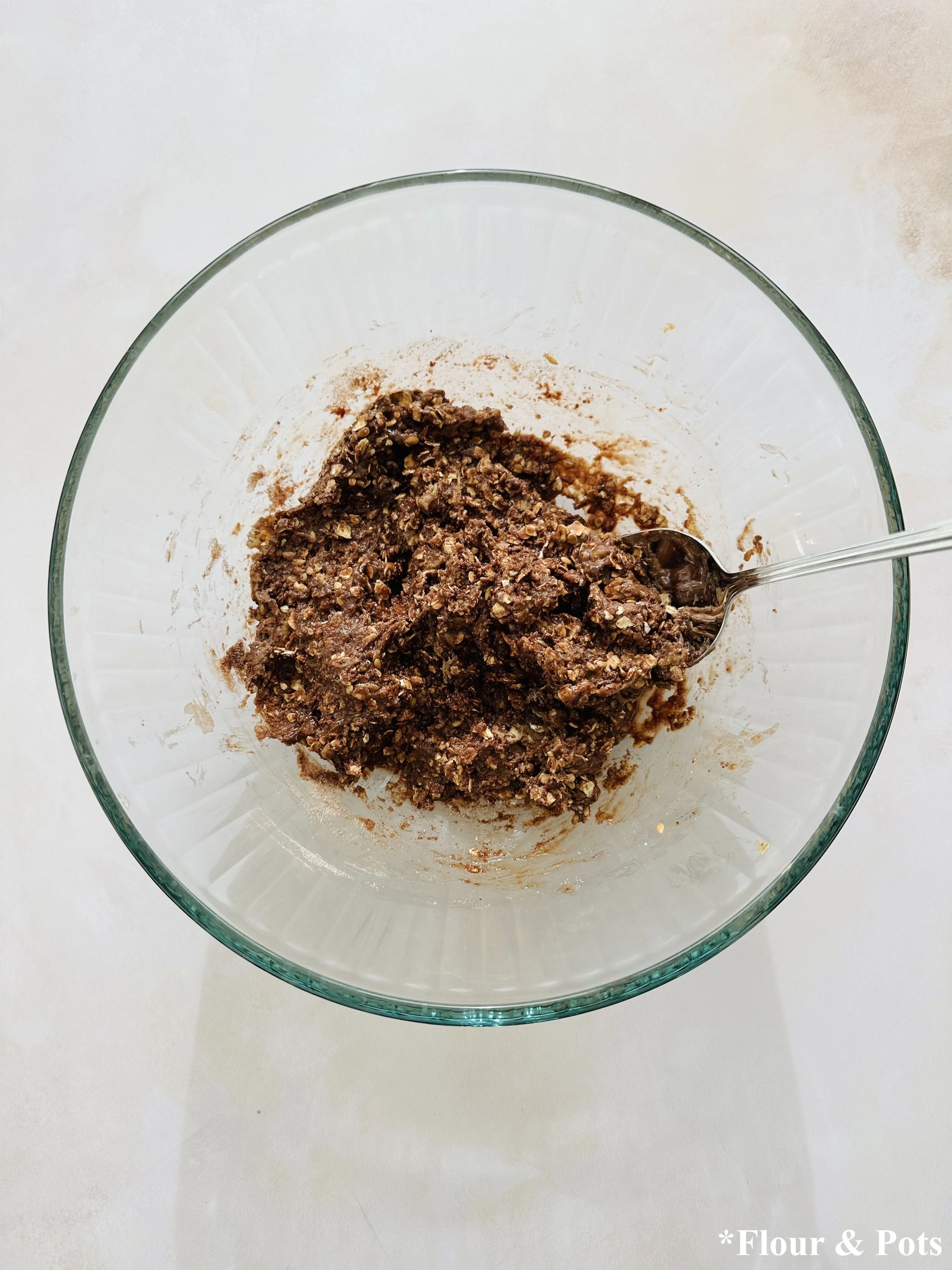 No-bake protein bites made with oats, almond butter, and chocolate protein powder