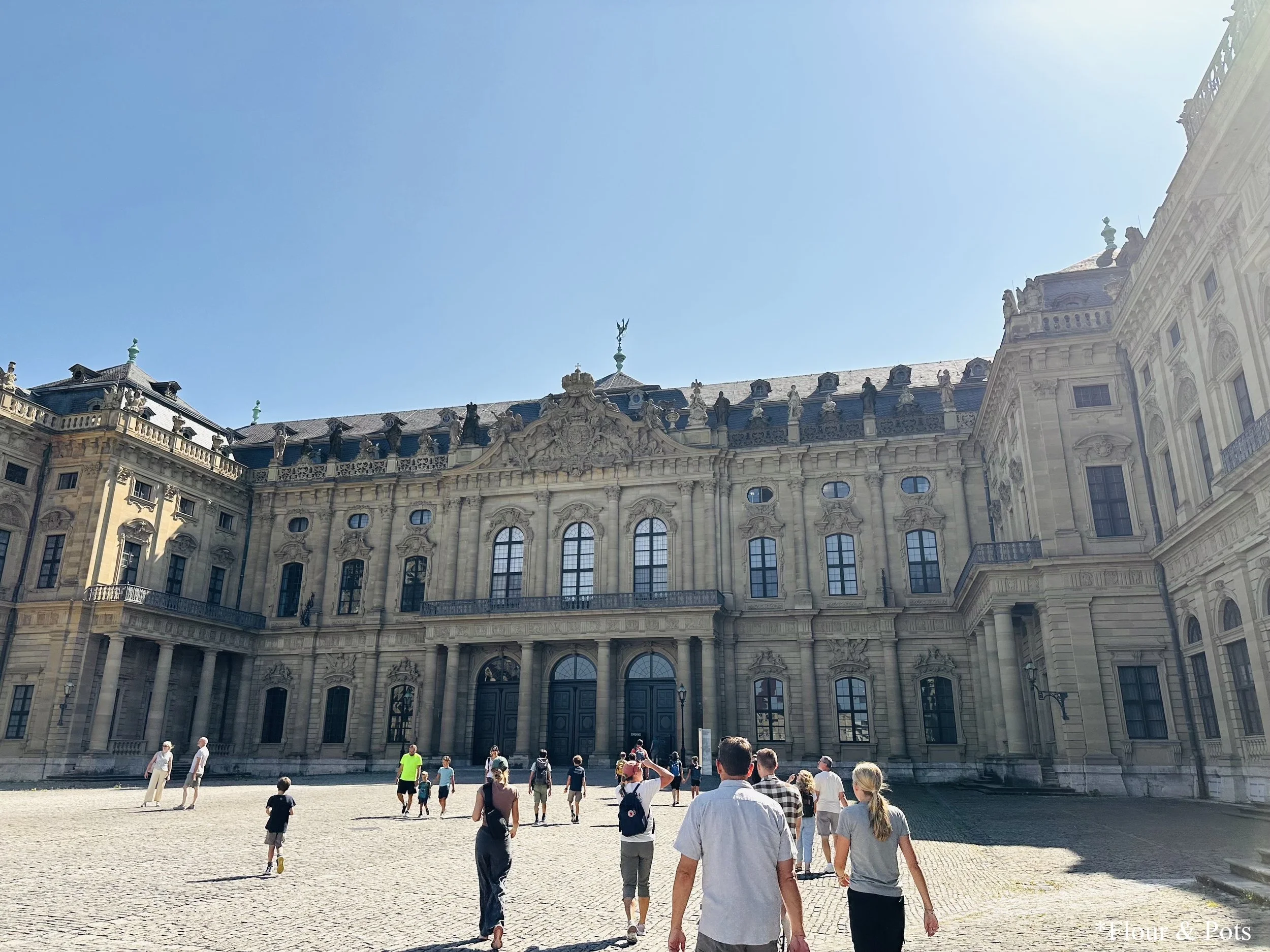 The front façade of the Würzburg Residence, a Baroque palace in Germany.