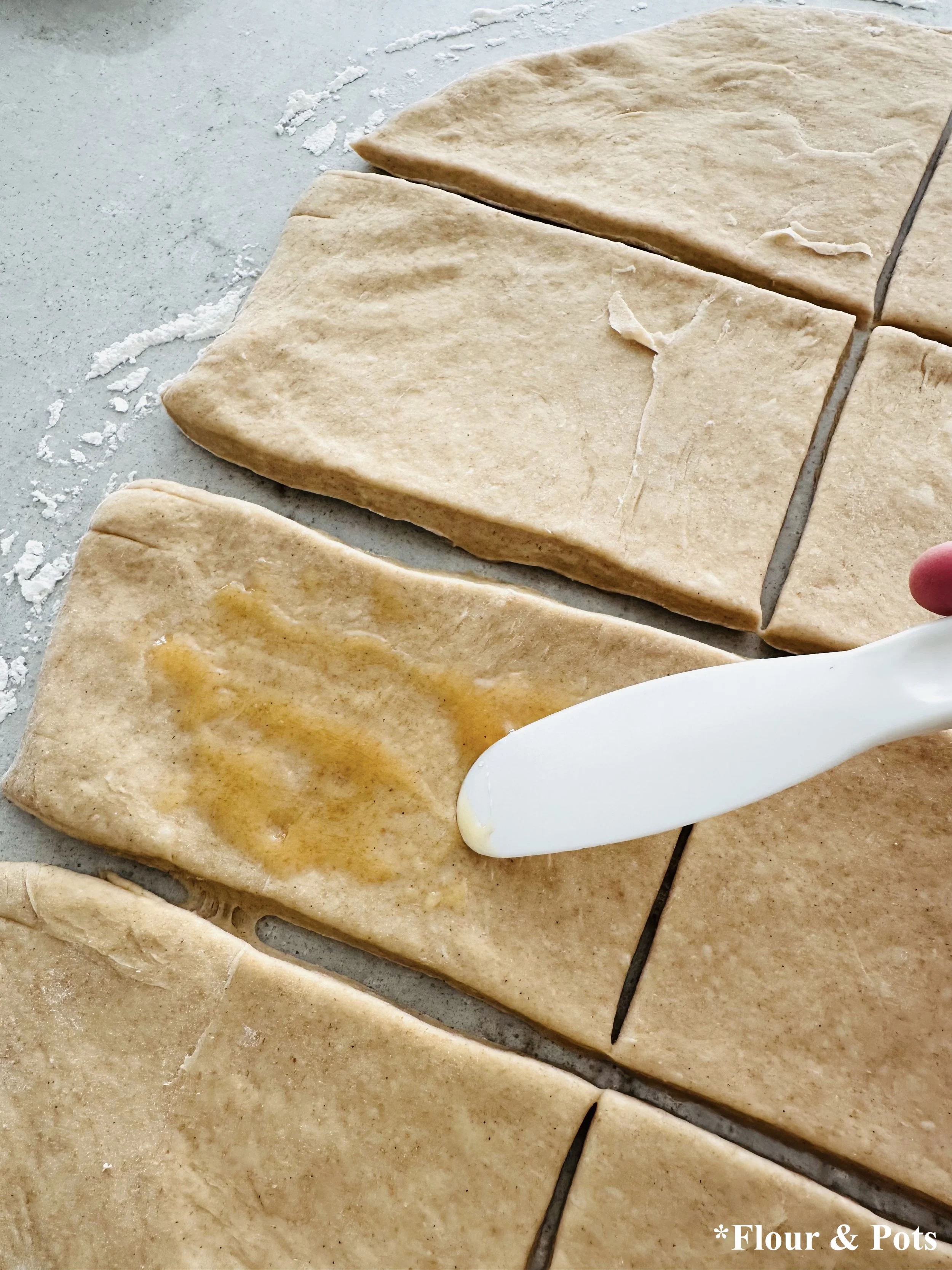 Bread Dough cut into 8 pieces and brushed with honey