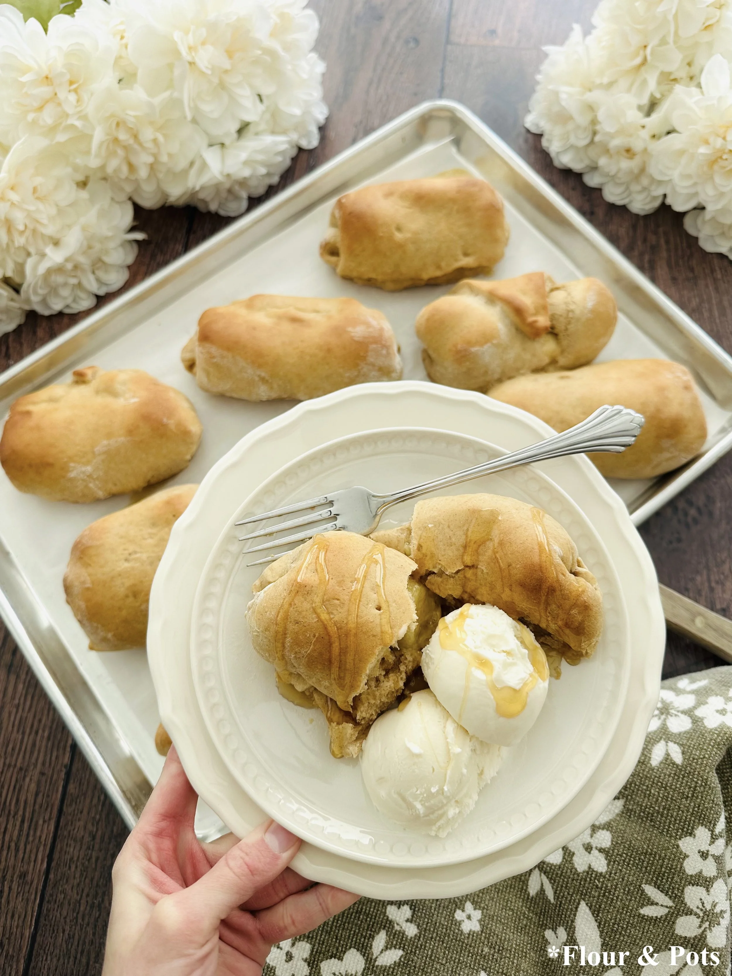 Honey banana bread rolls made with whole wheat flour served warm with a drizzle of honey