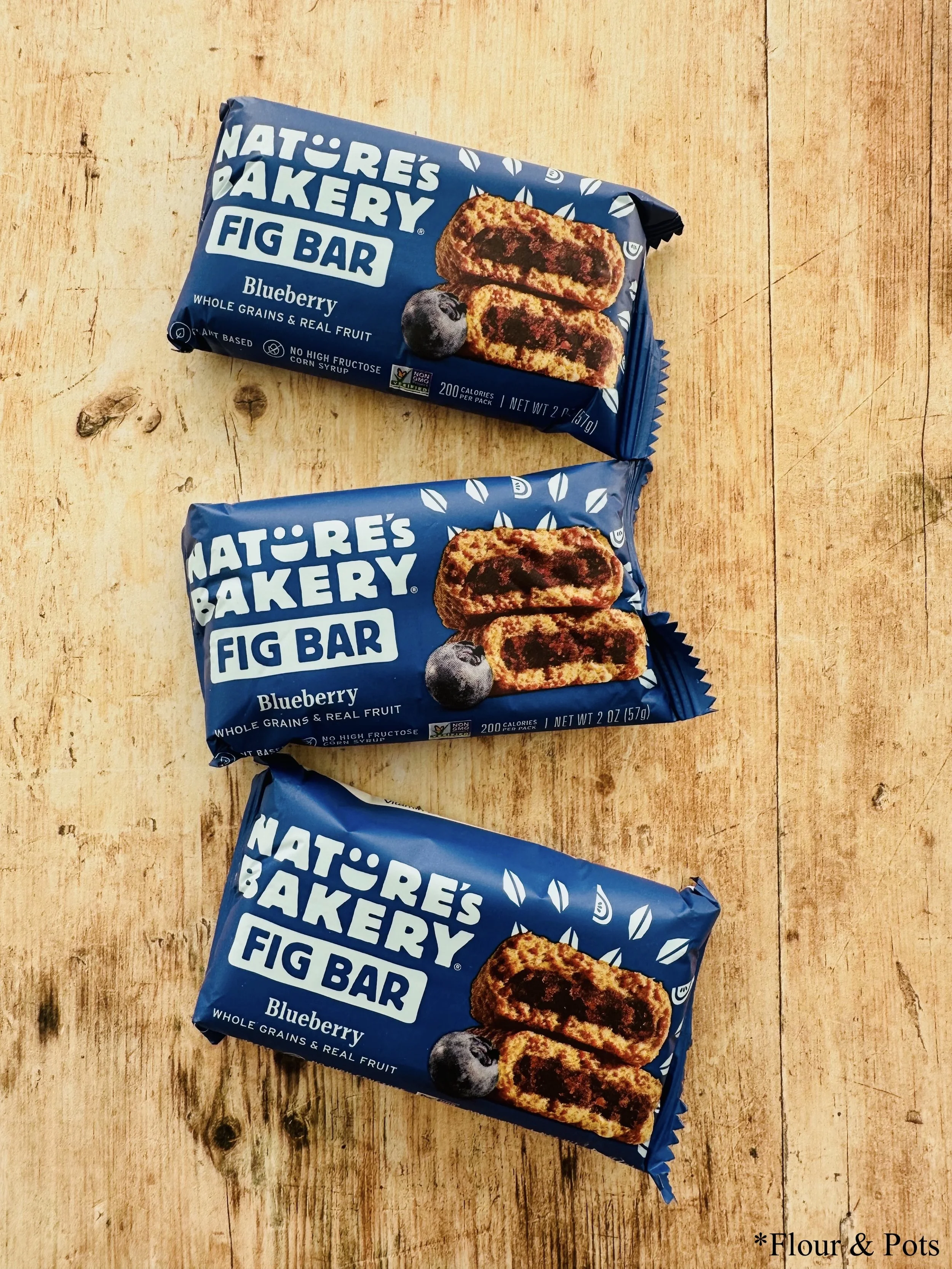 Nature's Bakery blueberry fig bar package featuring a fresh, blueberry-themed design.