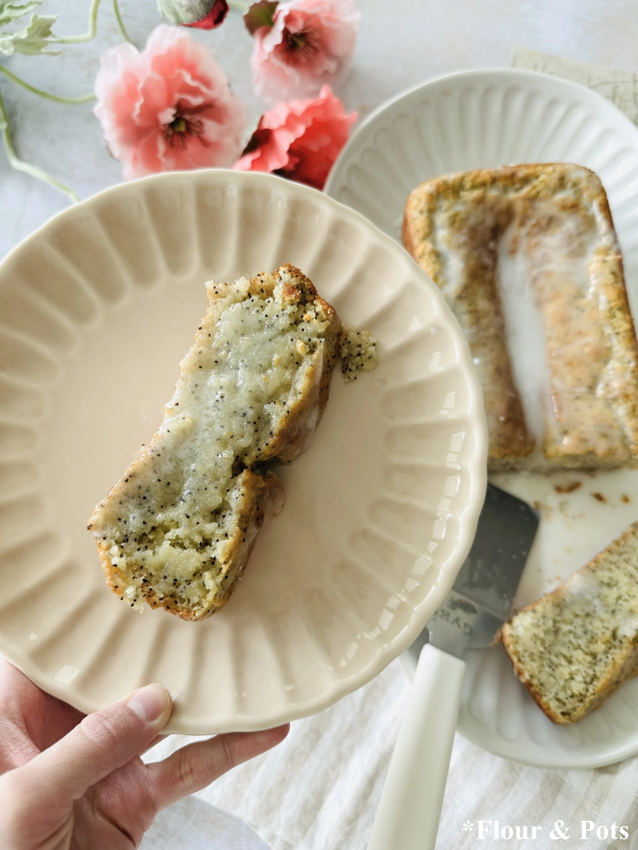 Moist almond flour poppy seed bread with white glaze