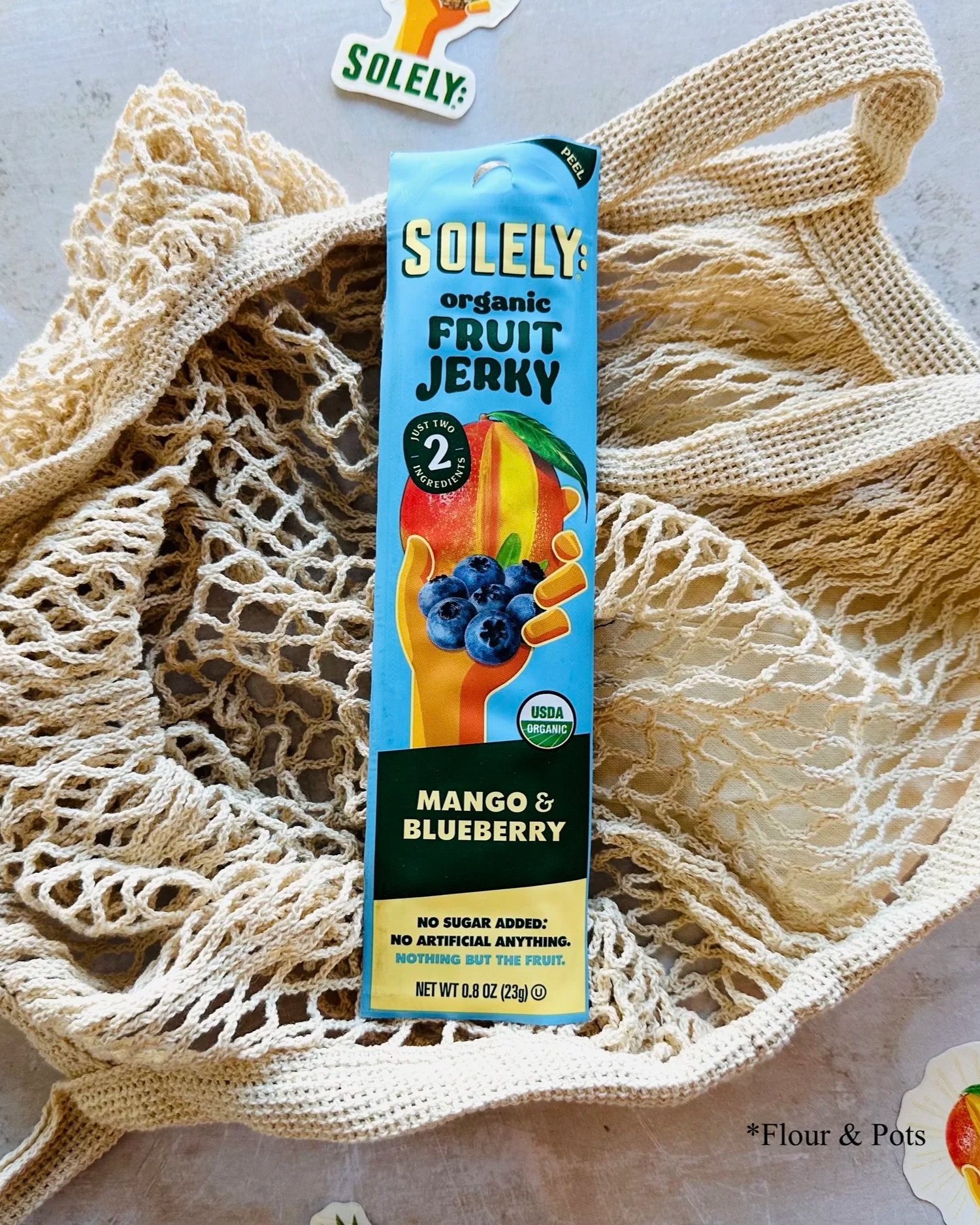 Solely Organic Mango & Blueberry fruit jerky stick package showcasing the fruity flavor blend.