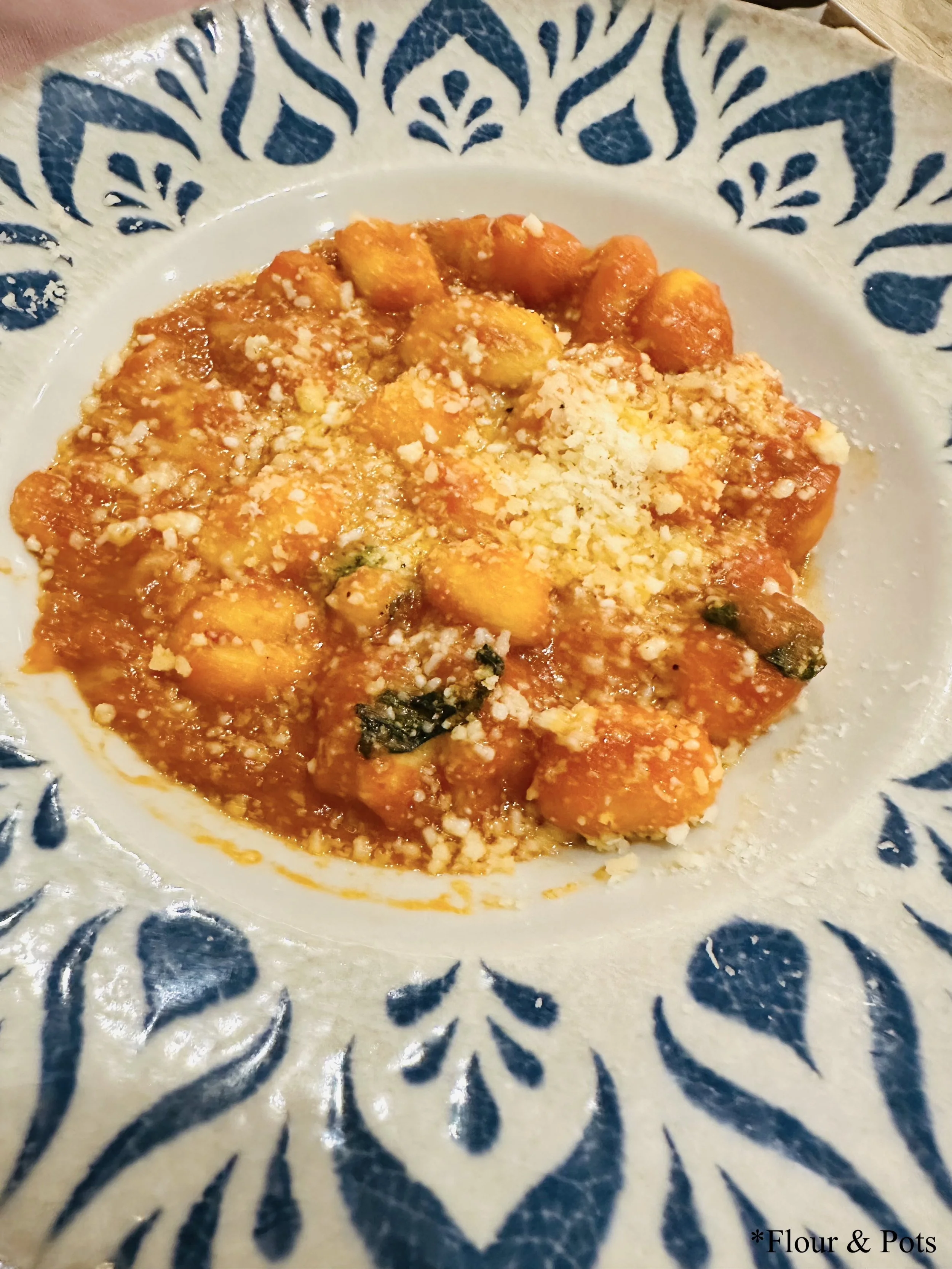Gnocchi with tomato sauce served at La Panetteria in Rome, Italy.