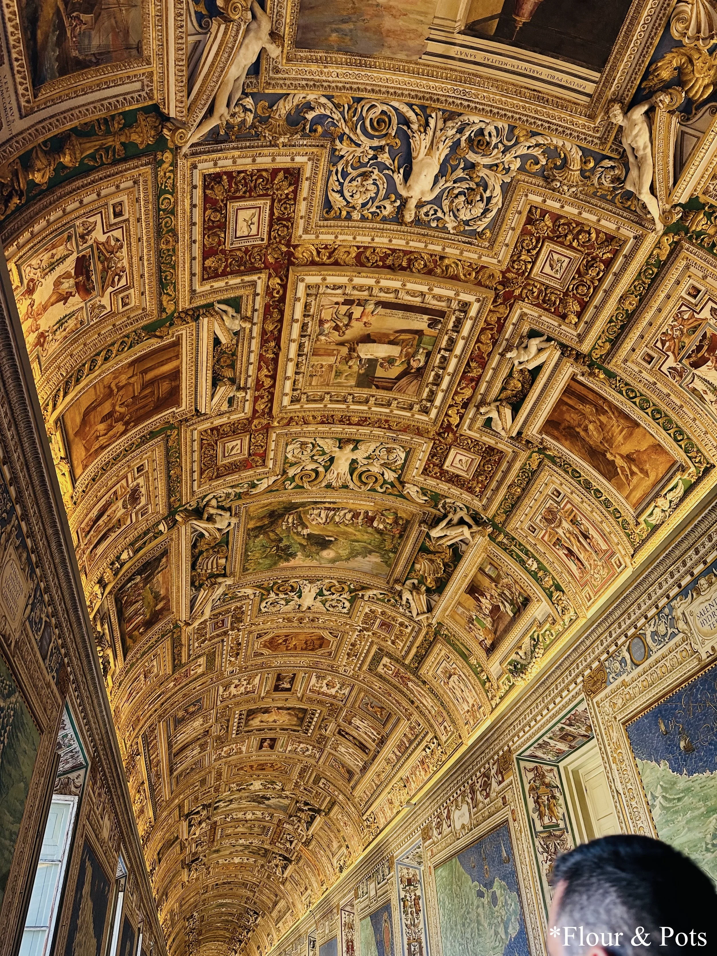 Vatican Museum's golden portrait ceiling, showcasing intricate artwork and stunning details in Rome, Italy.