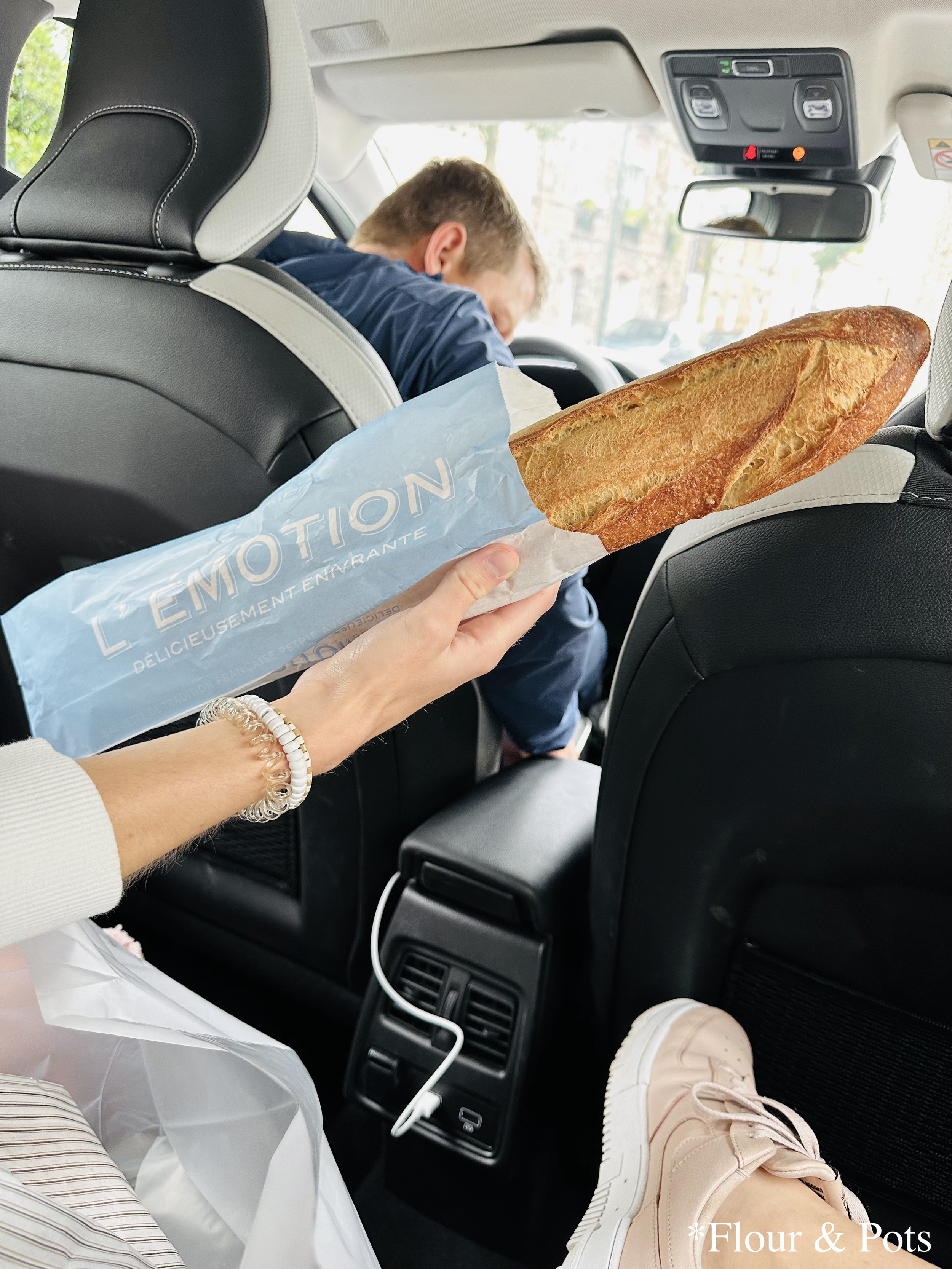 Classic French baguette fresh from Là…Pain bakery outside Paris, France.