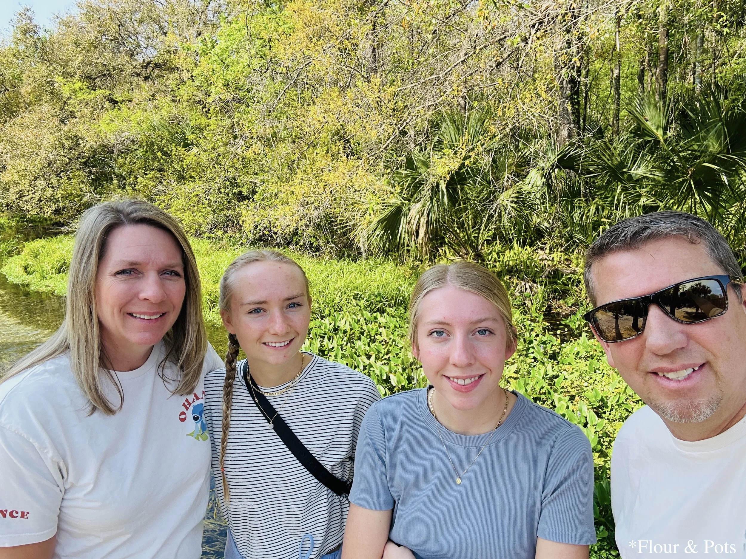 Family selfie at Kelly Park’s crystal-clear springs in Apopka, Florida.