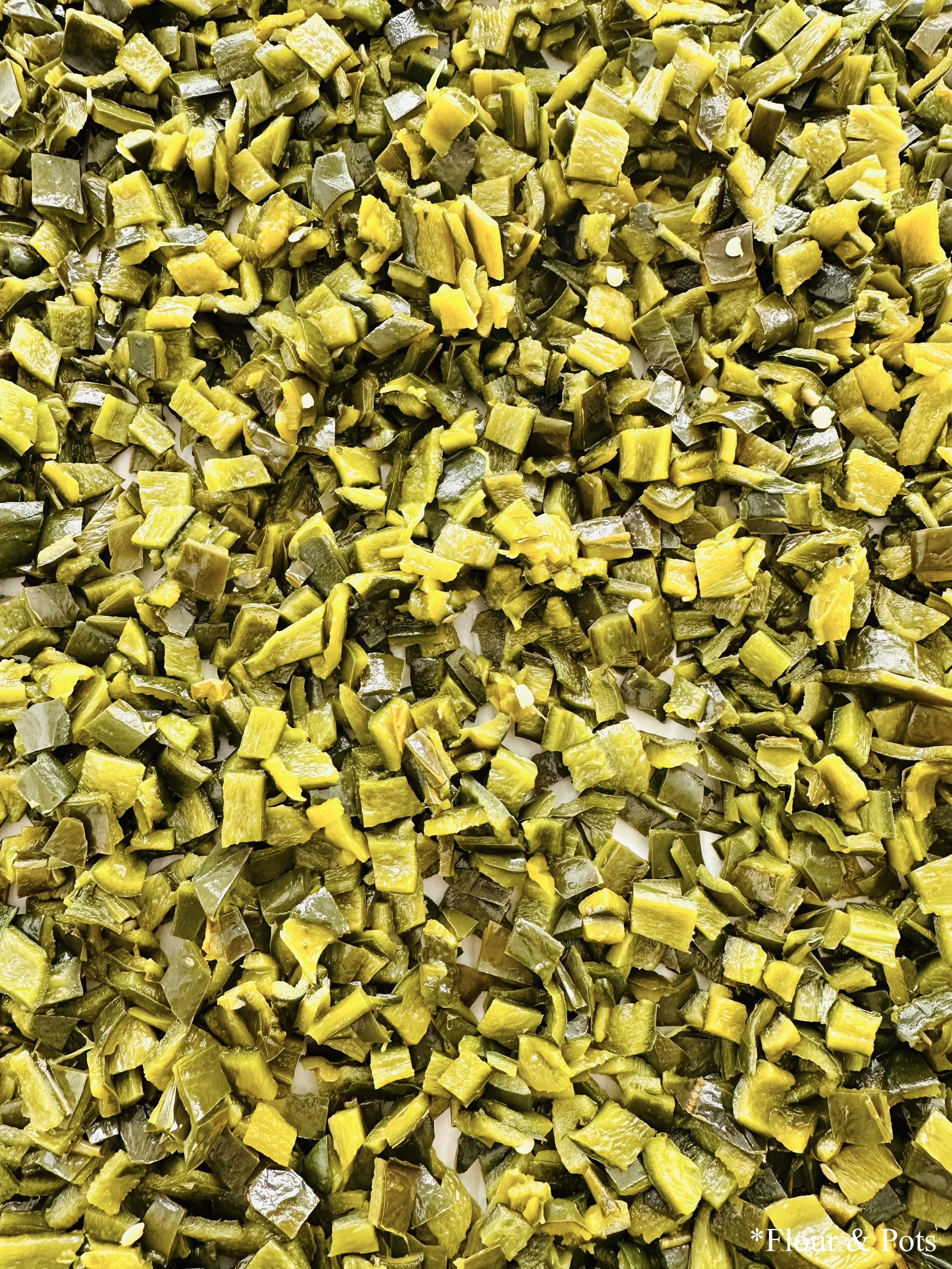 Roasted poblano pepper chunks, perfect for soups, sauces, or Mexican dishes.