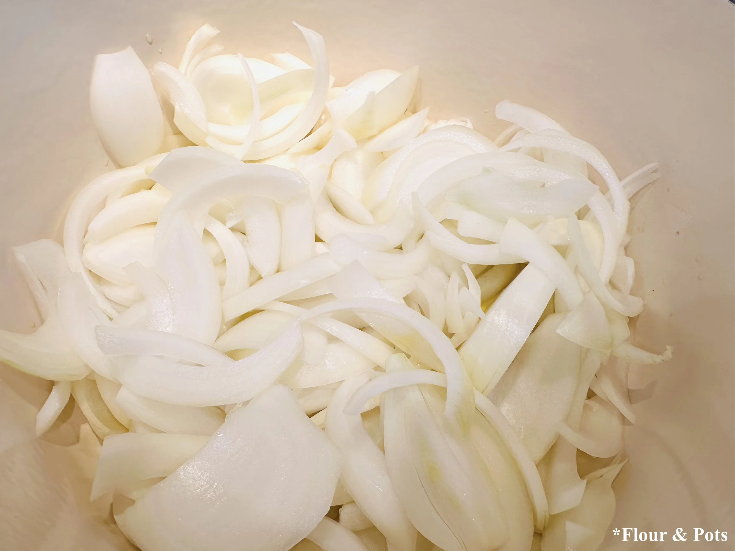 Pan of Sliced Onions - Ready to Cook for a Creamy French Onion Gnocchi Soup
