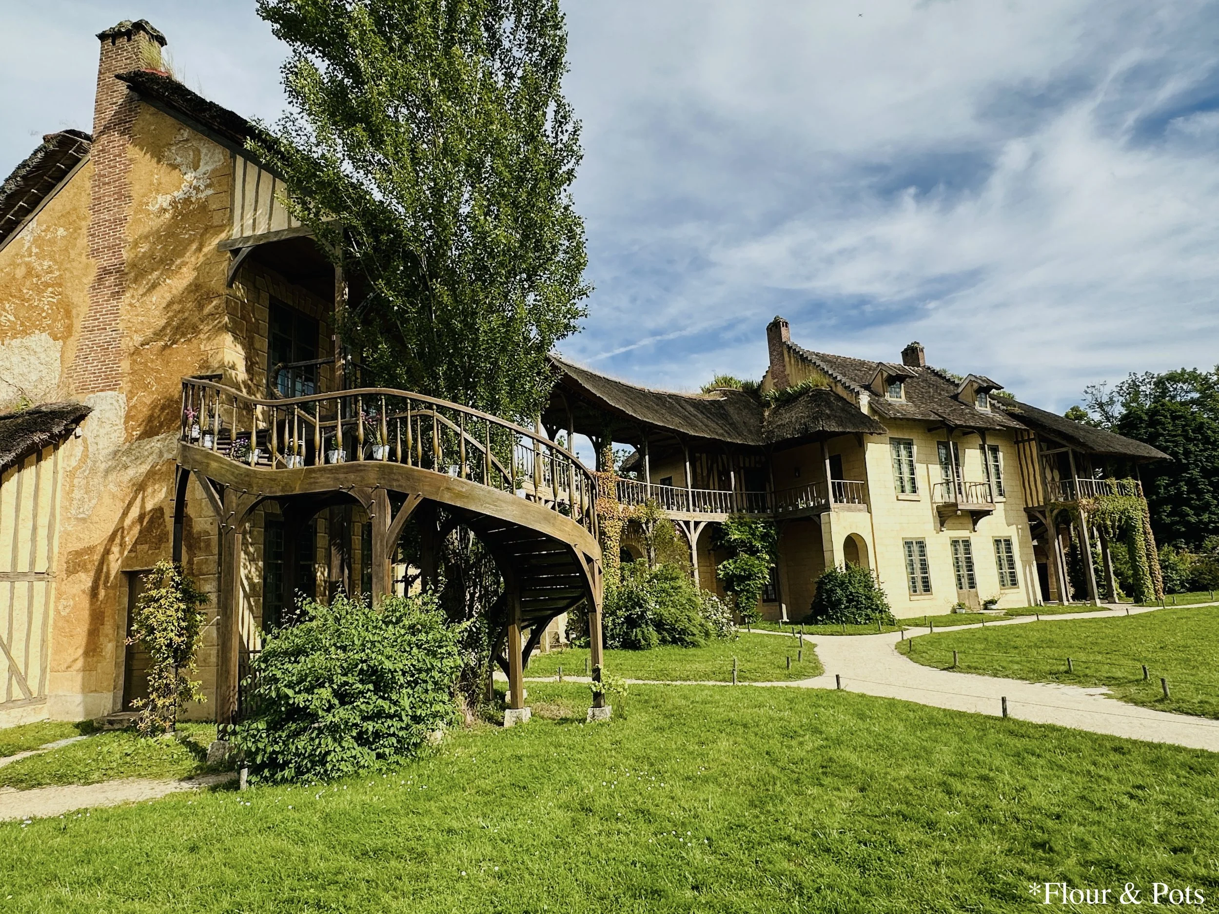 Cute and quaint cottages in the peaceful Queen’s Hamlet Village at Versailles.