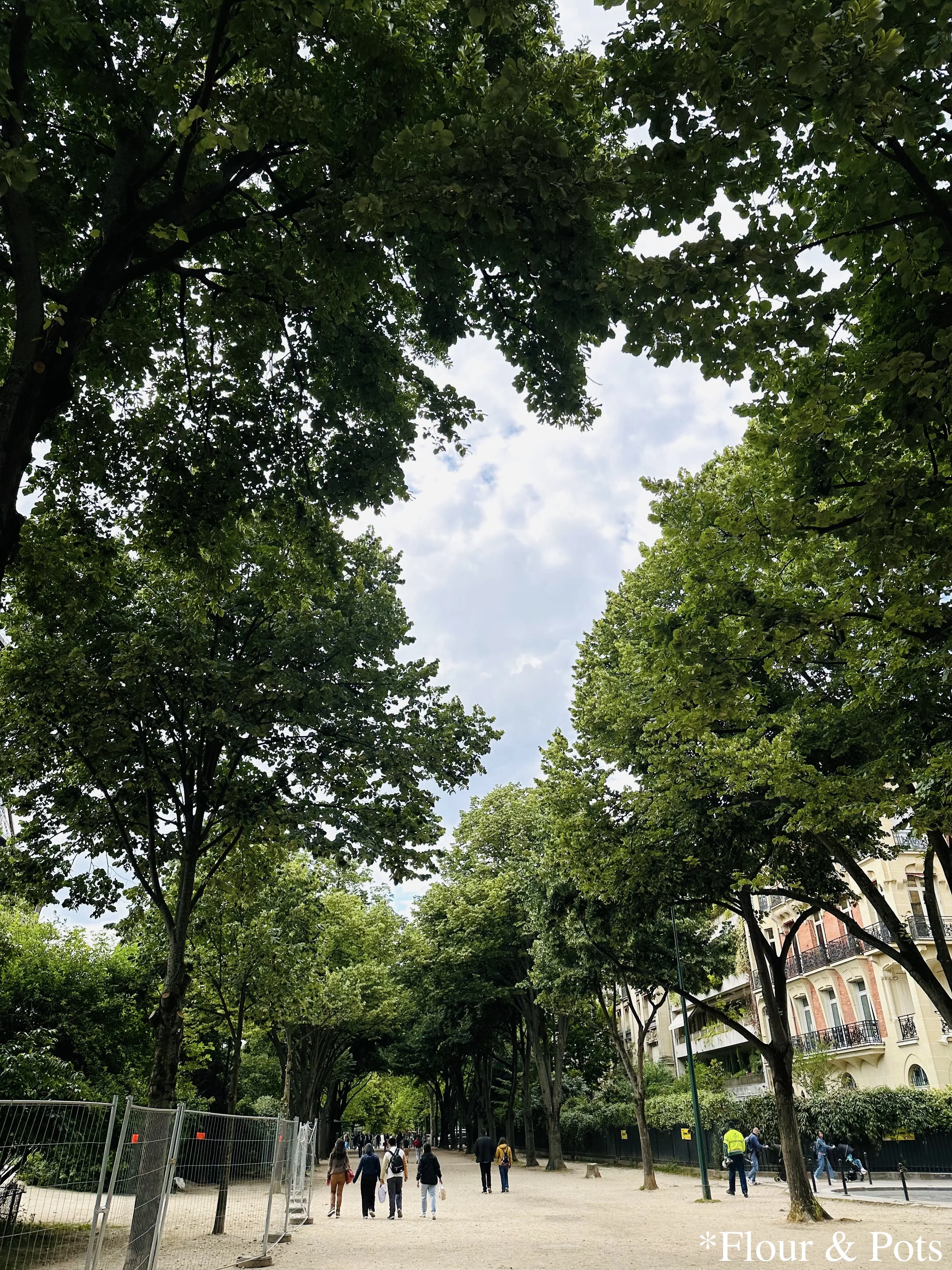 Walkways leading toward the Eiffel Tower in Paris, France.