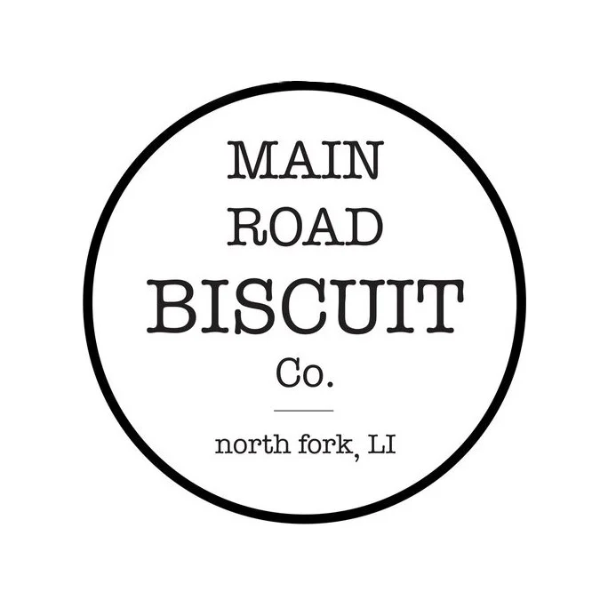 A circular logo with the text "Main Road Biscuit Co." and "north fork, LI" inside.
