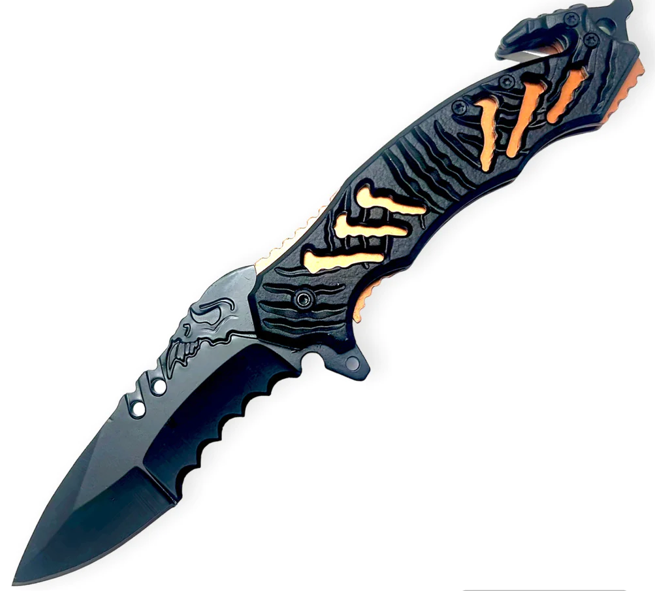 Black tactical folding knife with jagged blade, skull details, and orange accents on the handle.