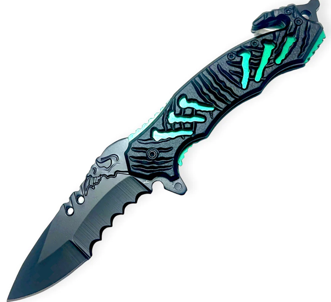 A black folding knife with a skull design on the handle and a skull logo on the blade, featuring a partially serrated edge and neon green accents.