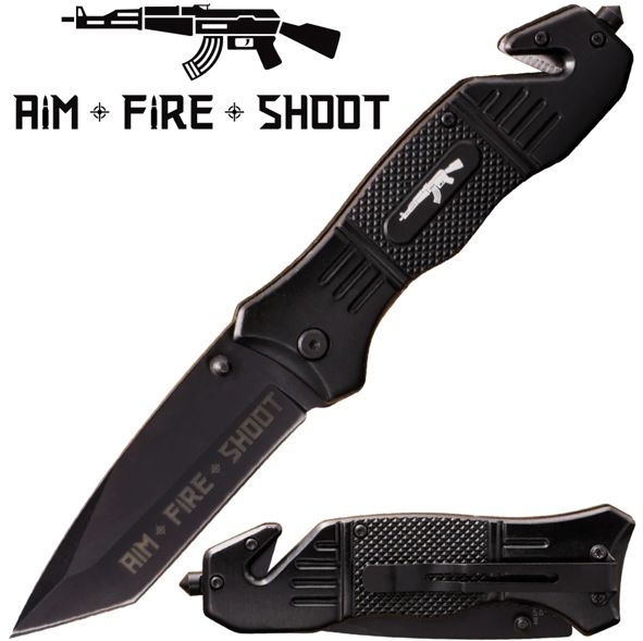 A black tactical knife with a textured handle and the words 'AM FIRE SHOOT' on the blade, and a black folding pocket clip attached to the handle.