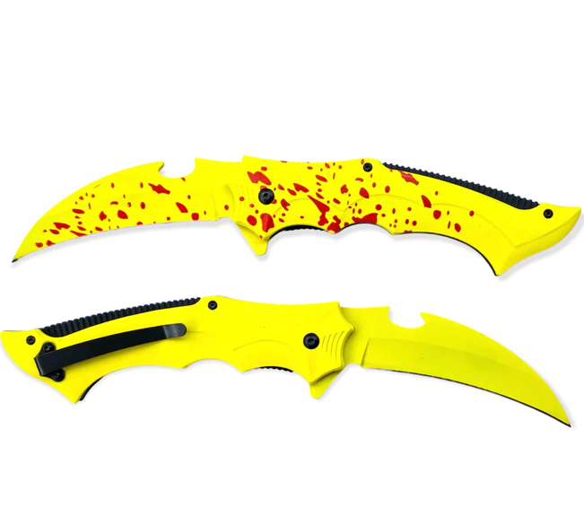Two yellow folding knives with black grips and red speckled designs, one closed and one open, against a white background.