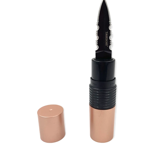 A lipstick with a knife blade attached where the lipstick tip would be, and a separate rose gold-colored cap.
