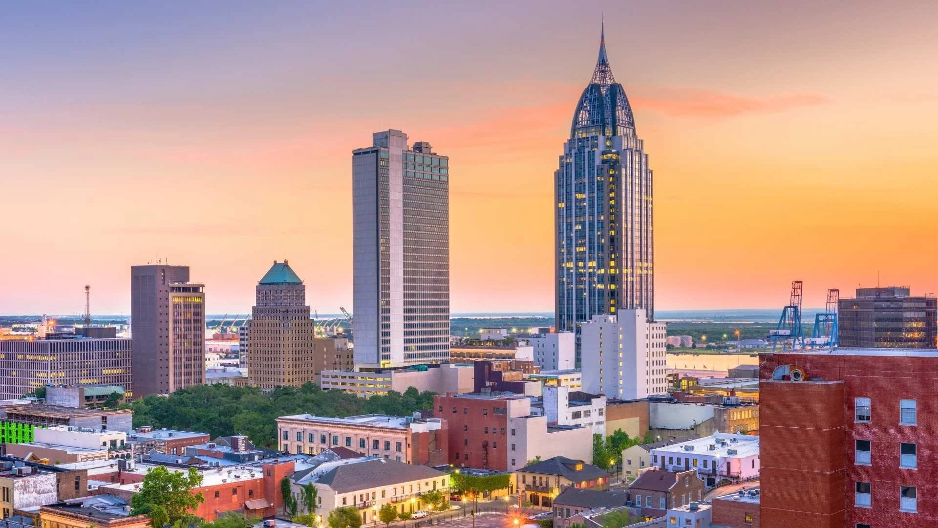 Mobile, Alabama skyline at sunset — a gateway city for Alabama travel trailer road trips along the Gulf Coast
