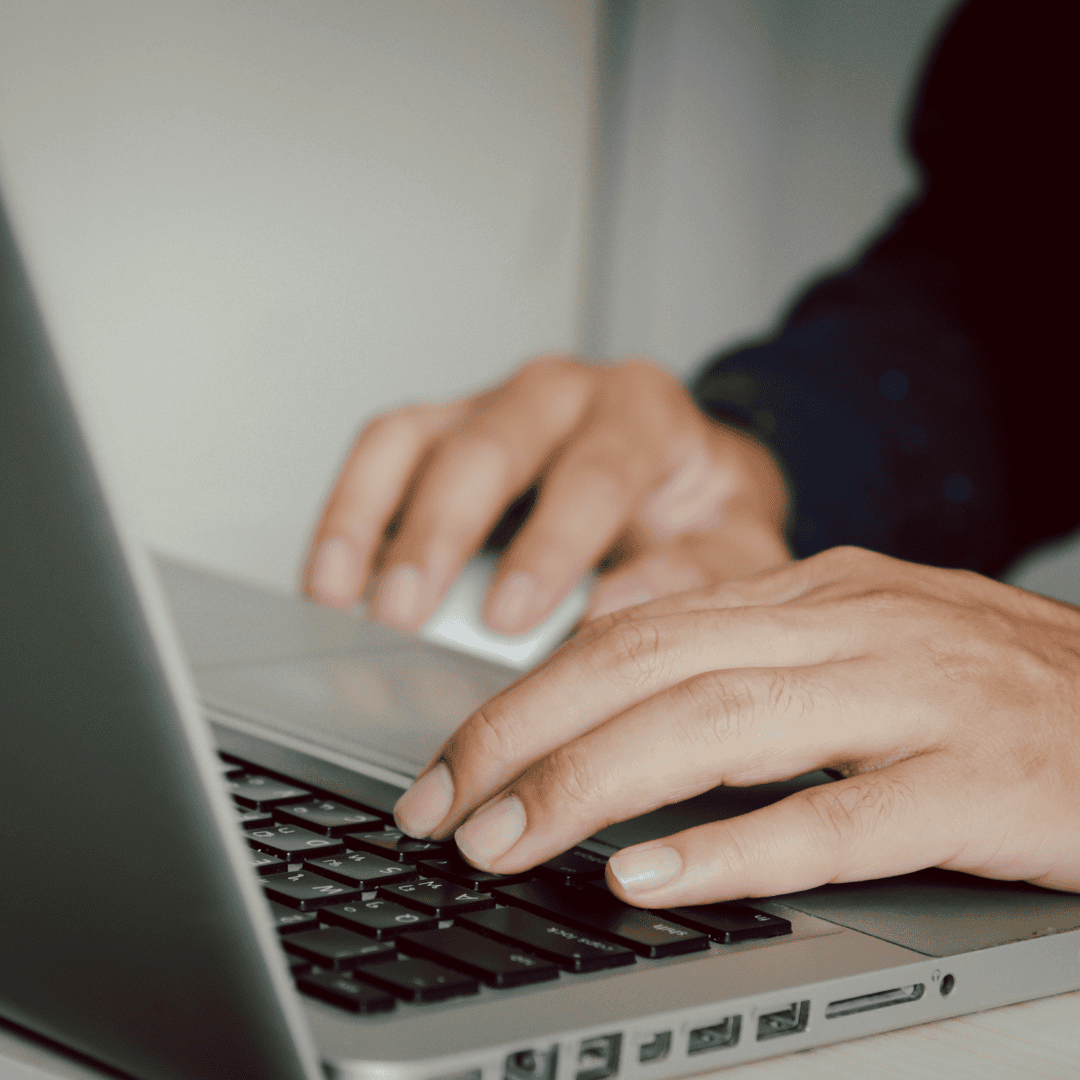person typing on computer