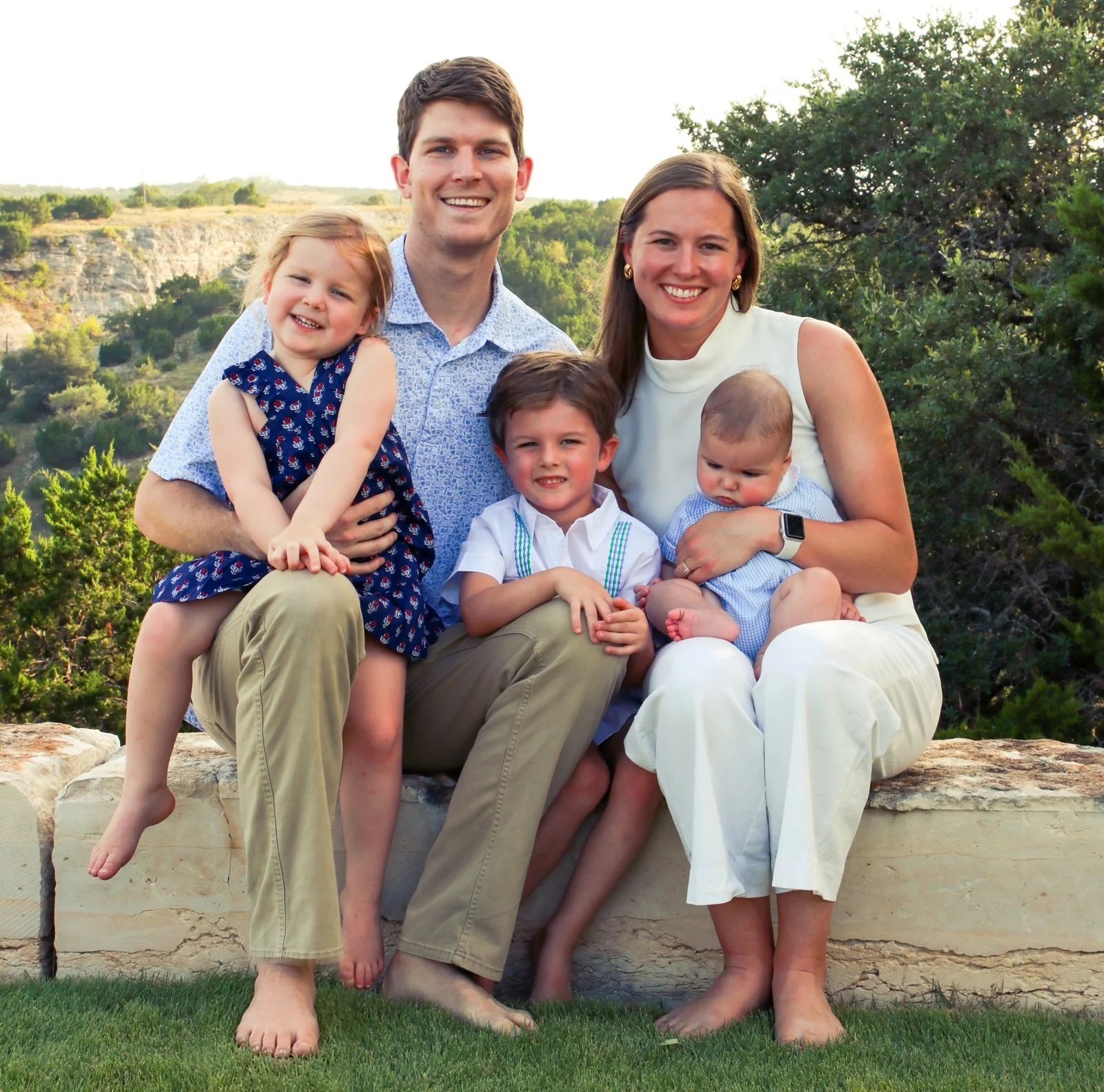Cinco Winston, founder of Trueline Striping in Waco, TX, with his wife Caroline and their three kids