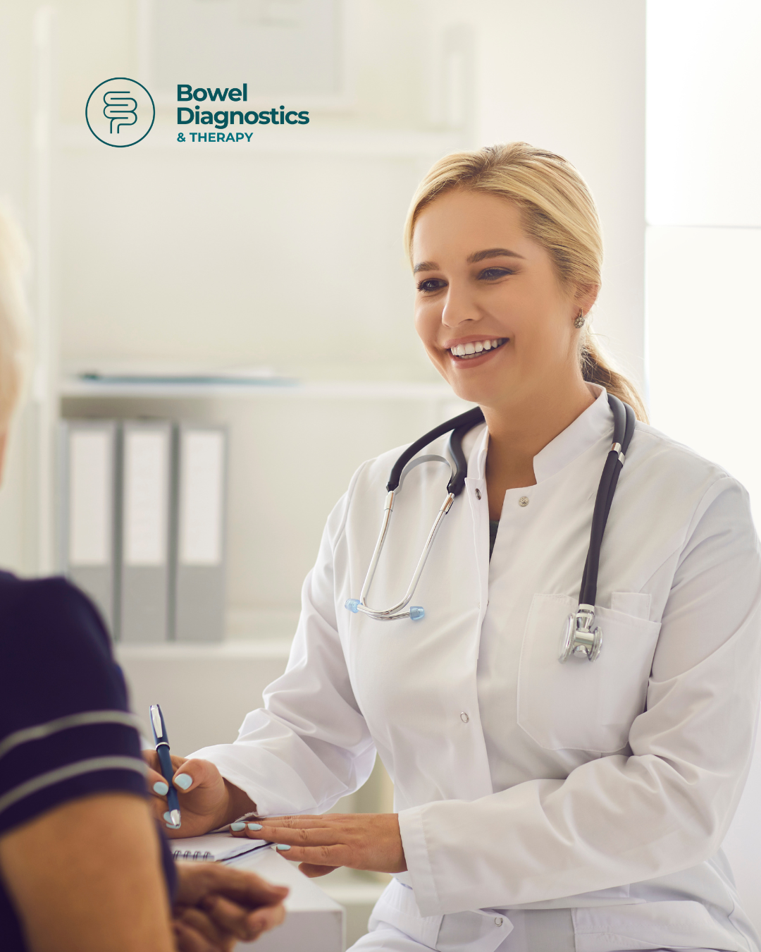 Doctor writing down assessment bowel health Australia