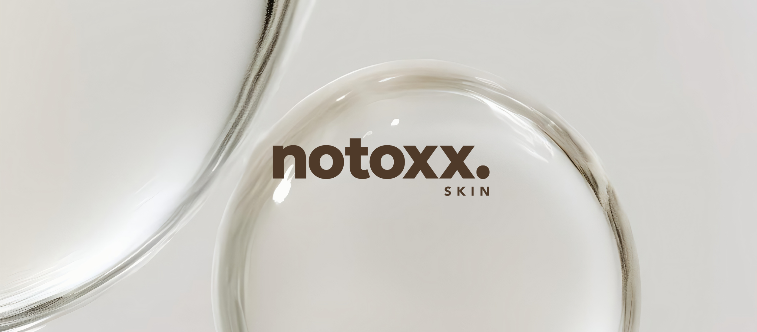 Close-up of a skincare product with the brand name 'notoxx. SKIN' in brown text, on a smooth, glossy surface with semi-transparent, curved glass elements.