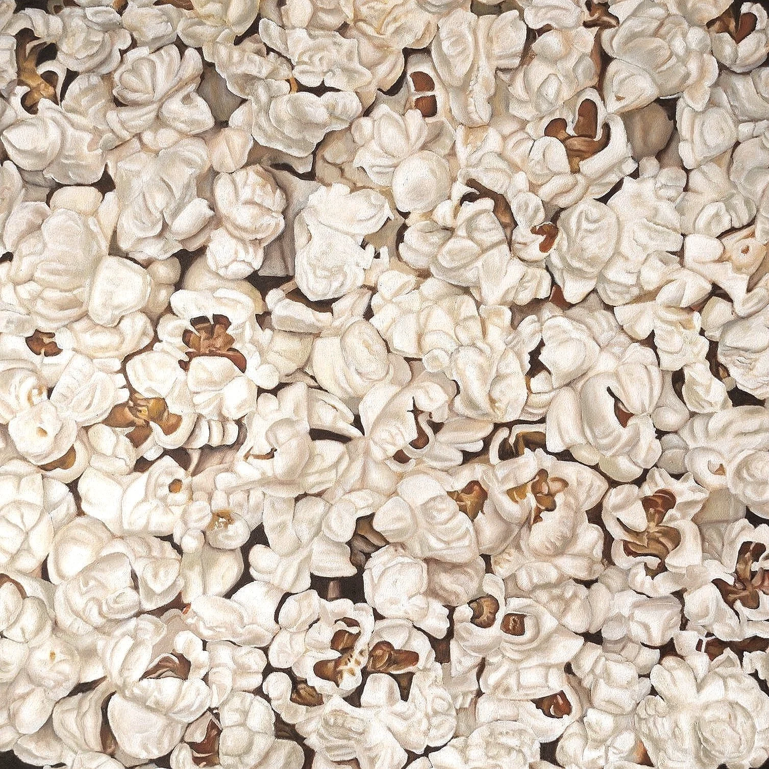 Mucchi di popcorn bianco e marrone.